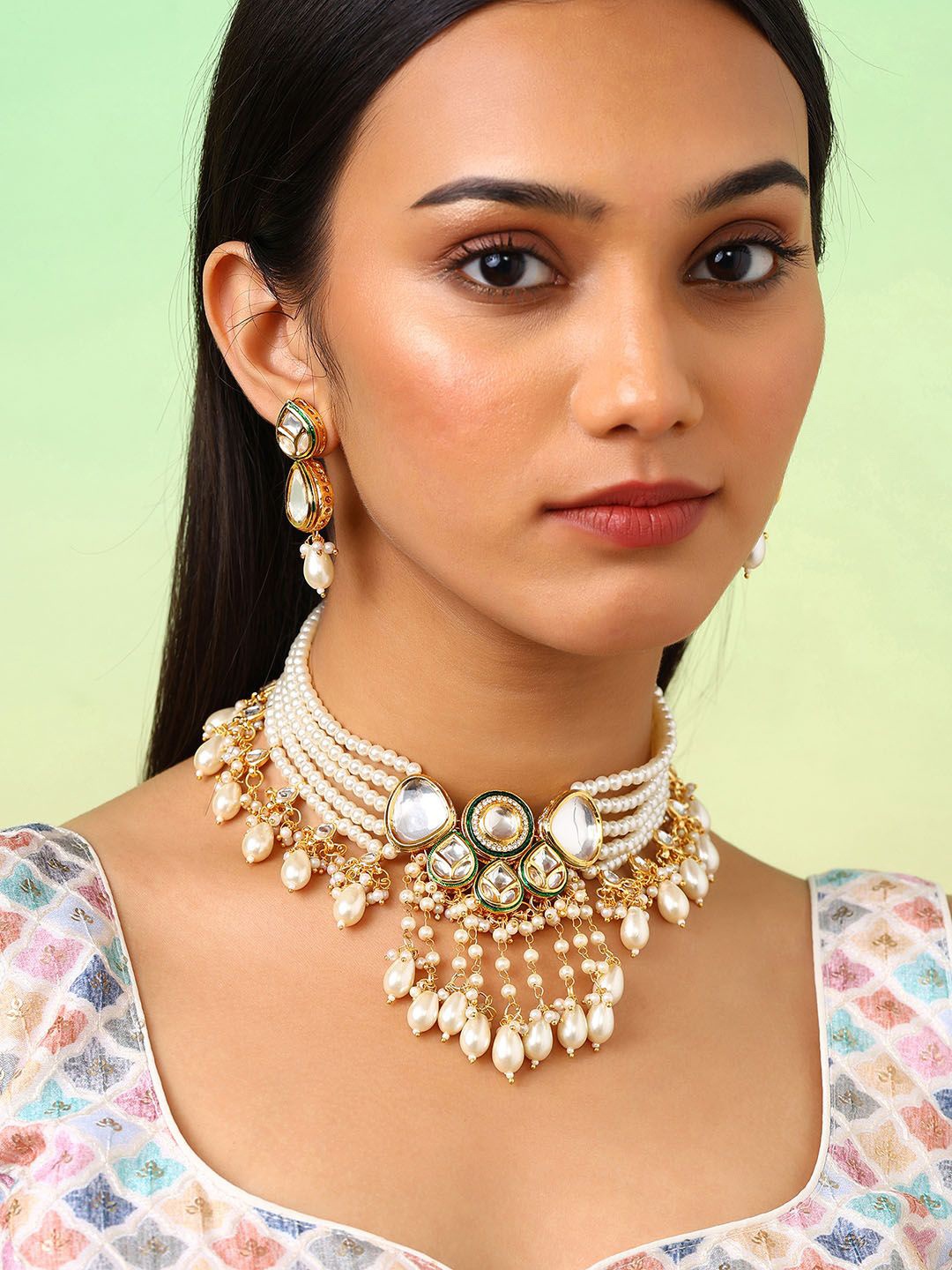 

Priyaasi Gold-Plated Kundan Stone Studded & Beaded Necklace and Earrings