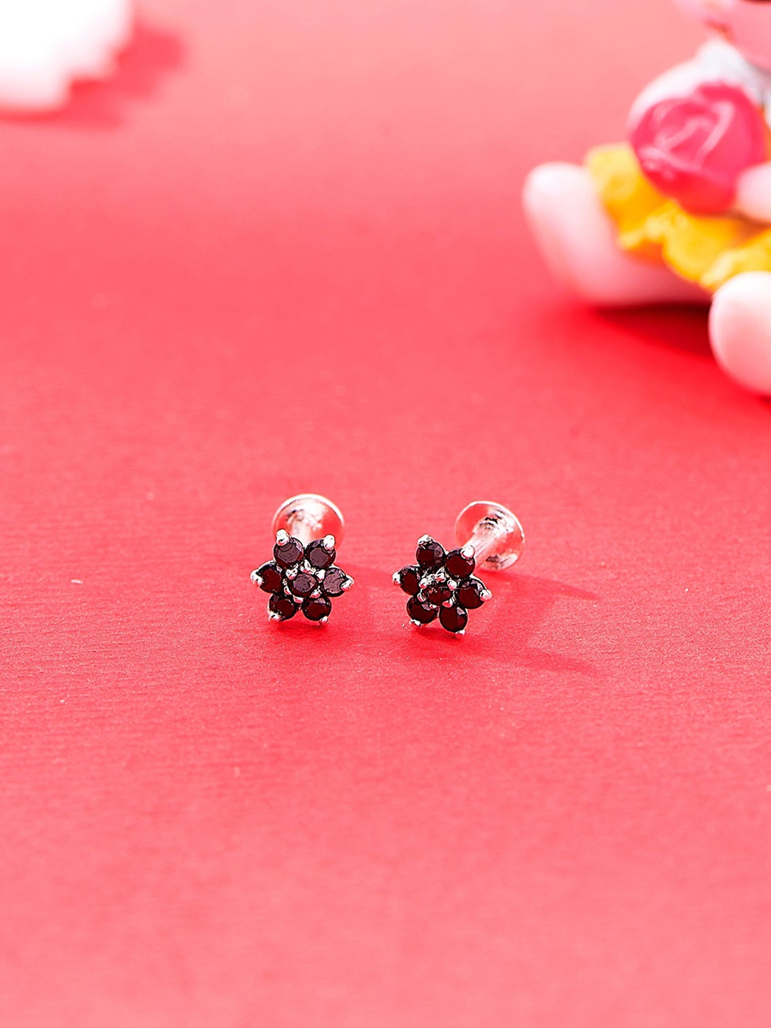 

Nipura 925 Sterling Silver-Plated Cubic Zirconia Studded Twinkle Star Studs Earrings