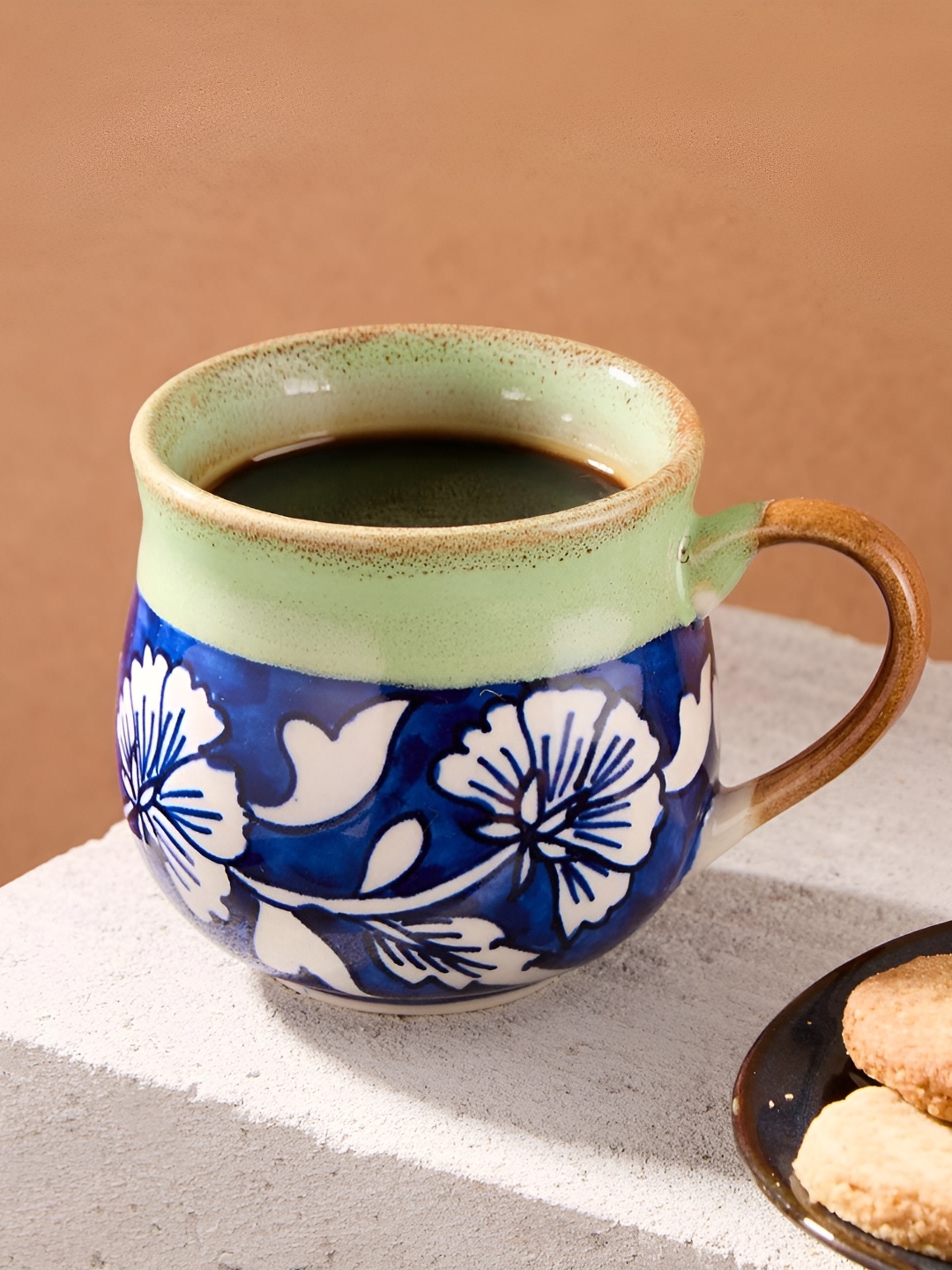 

Fabindia Blue & Green Floral Printed Ceramic Glossy Mugs Set of Cups and Mugs