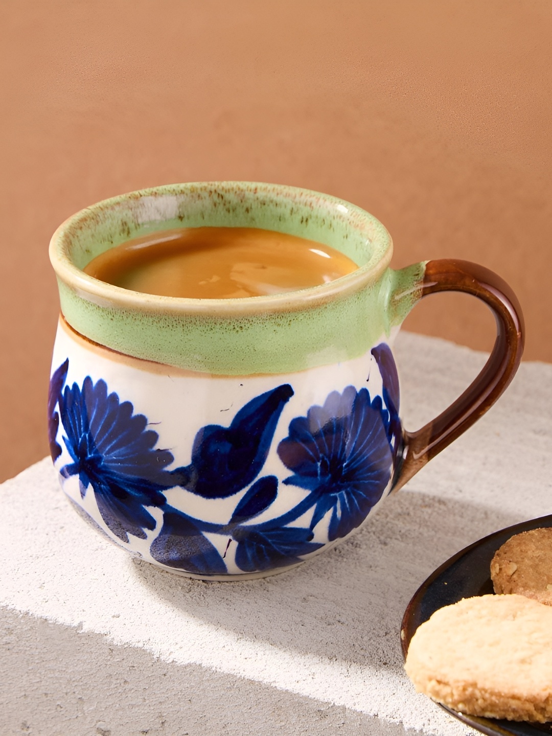 

Fabindia White & Blue Printed Ceramic Glossy Mugs Set of Cups and Mugs