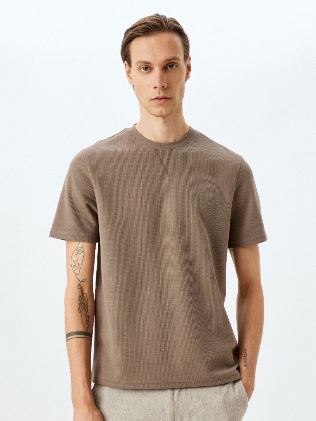 

Koton Men Solid Round Neck T-shirt, Beige
