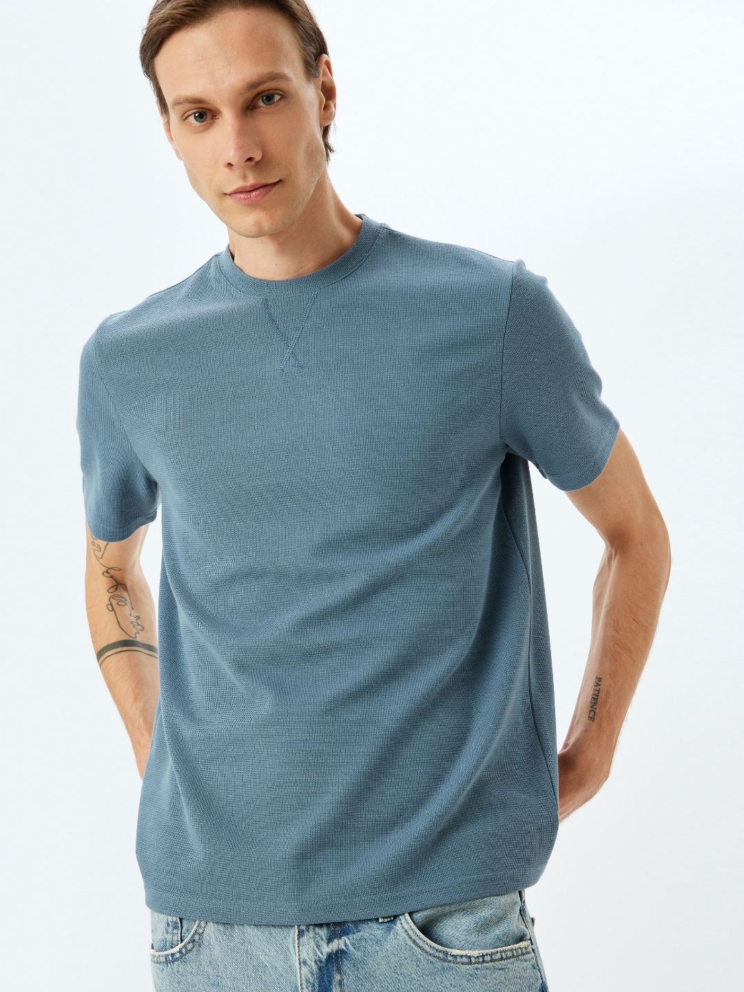 

Koton Men Solid Round Neck T-shirt, Blue