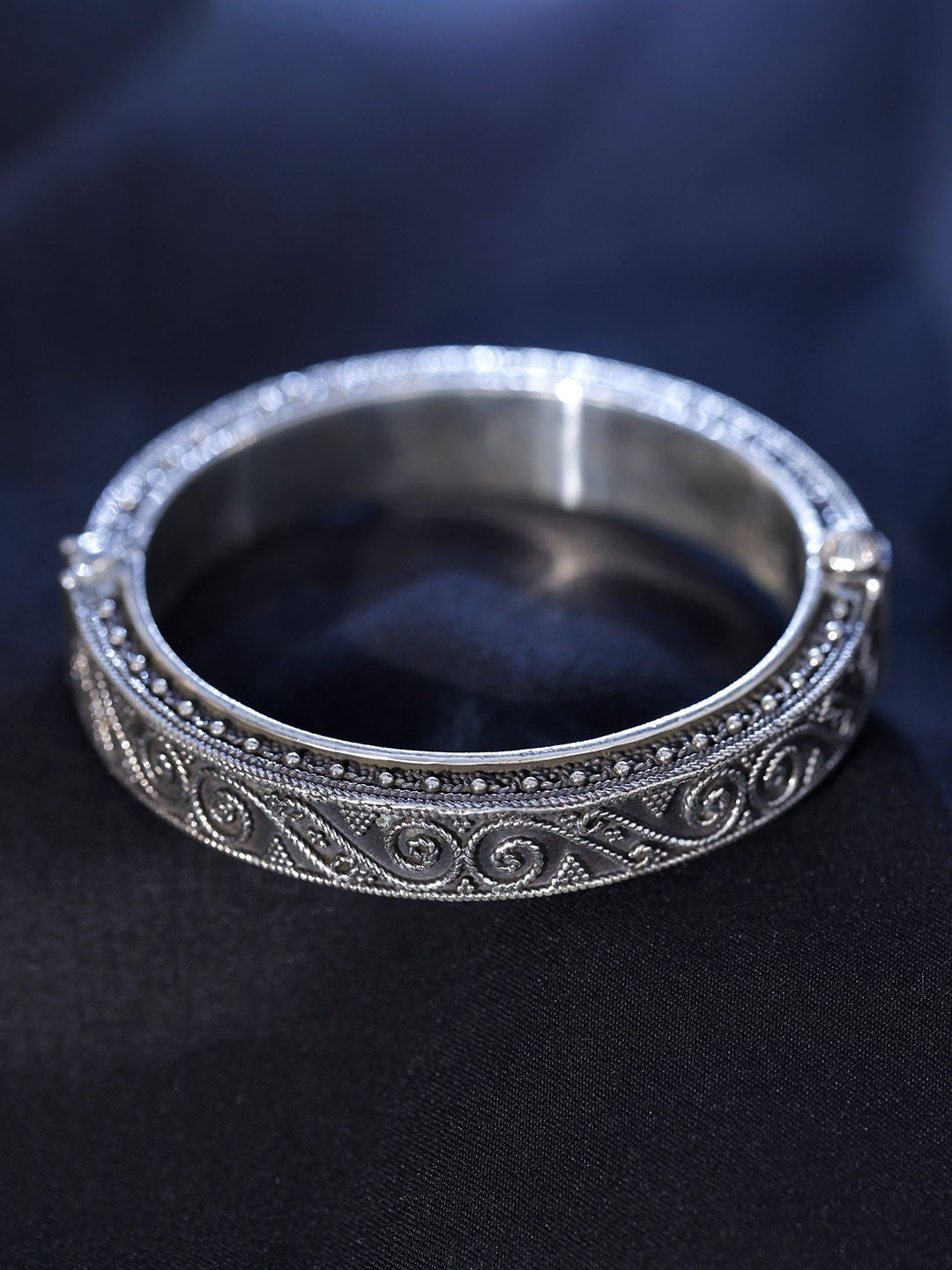 

Exotic India Openable Traditional Sterling Silver Bangle