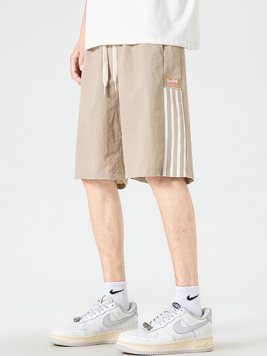 

StyleCast x Revolte Men Loose Fit Rapid-Dry Mid-Rise Shorts, Khaki