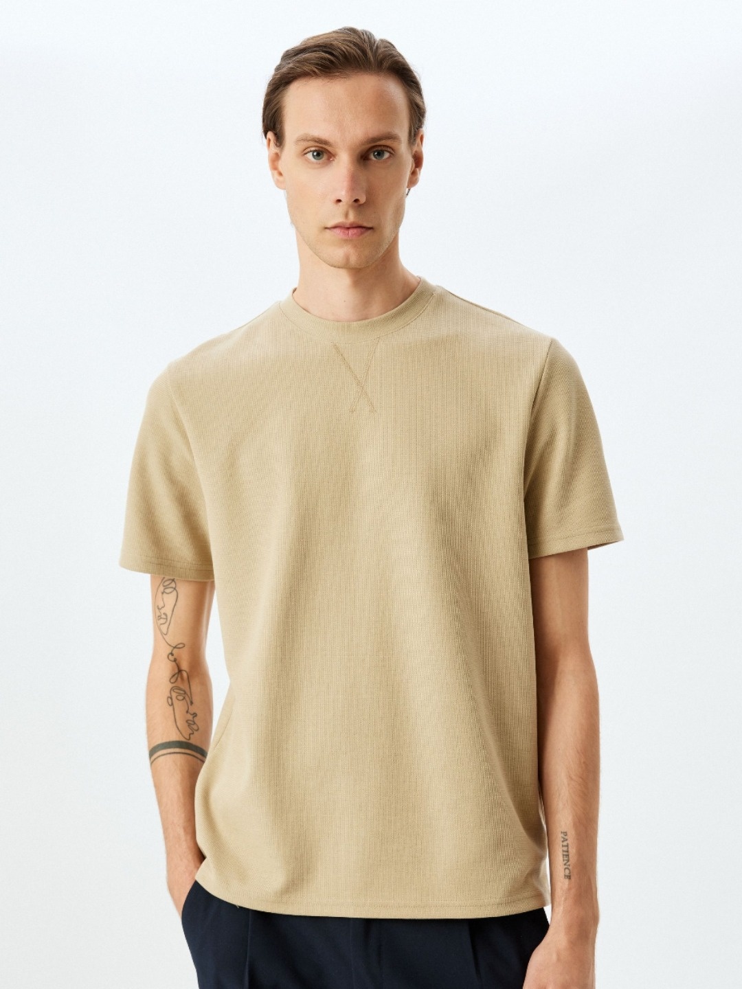 

Koton Men Solid Round Neck T-shirt, Beige