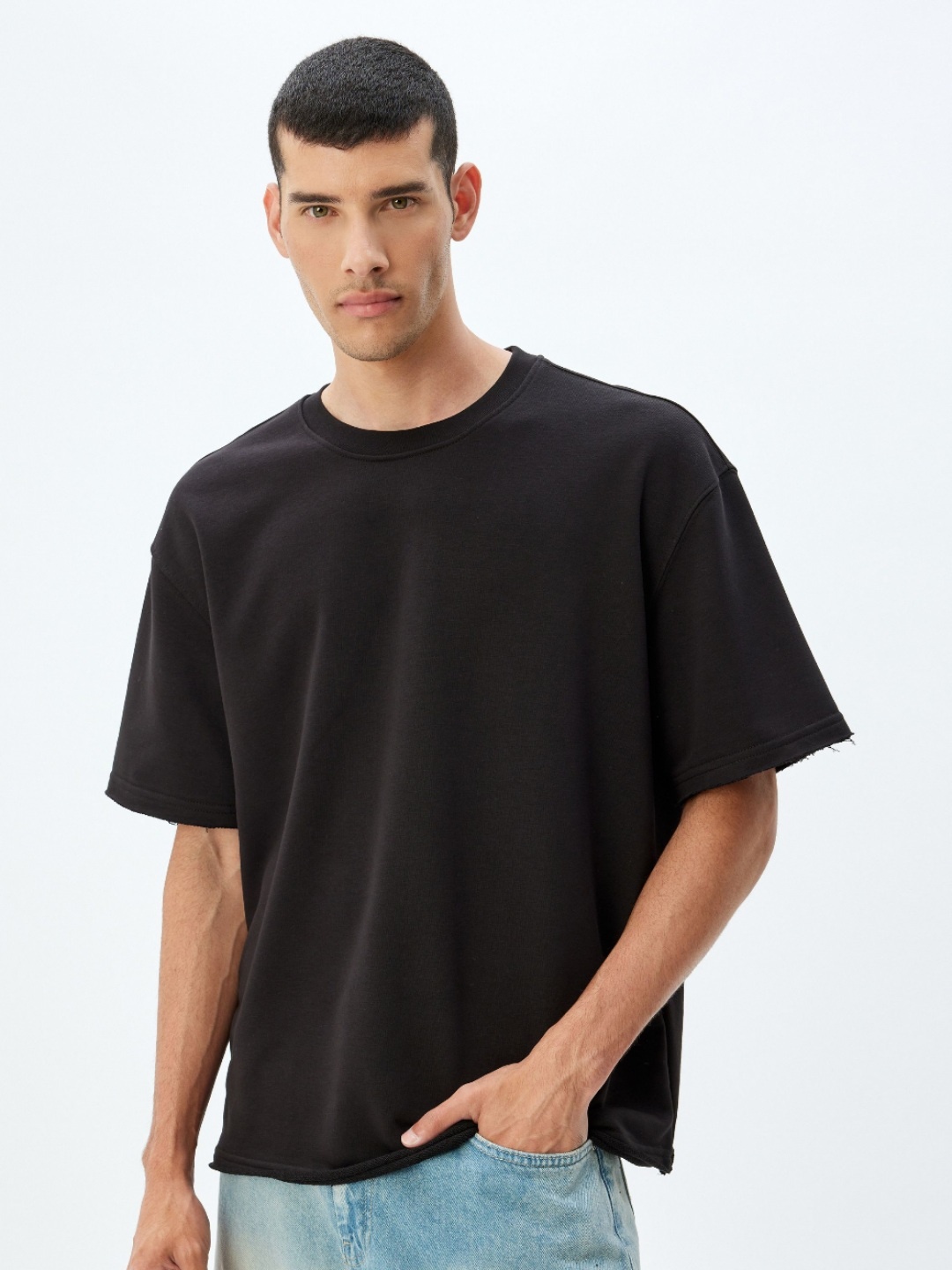 

Koton Men Solid Round Neck Cotton T-shirt, Black