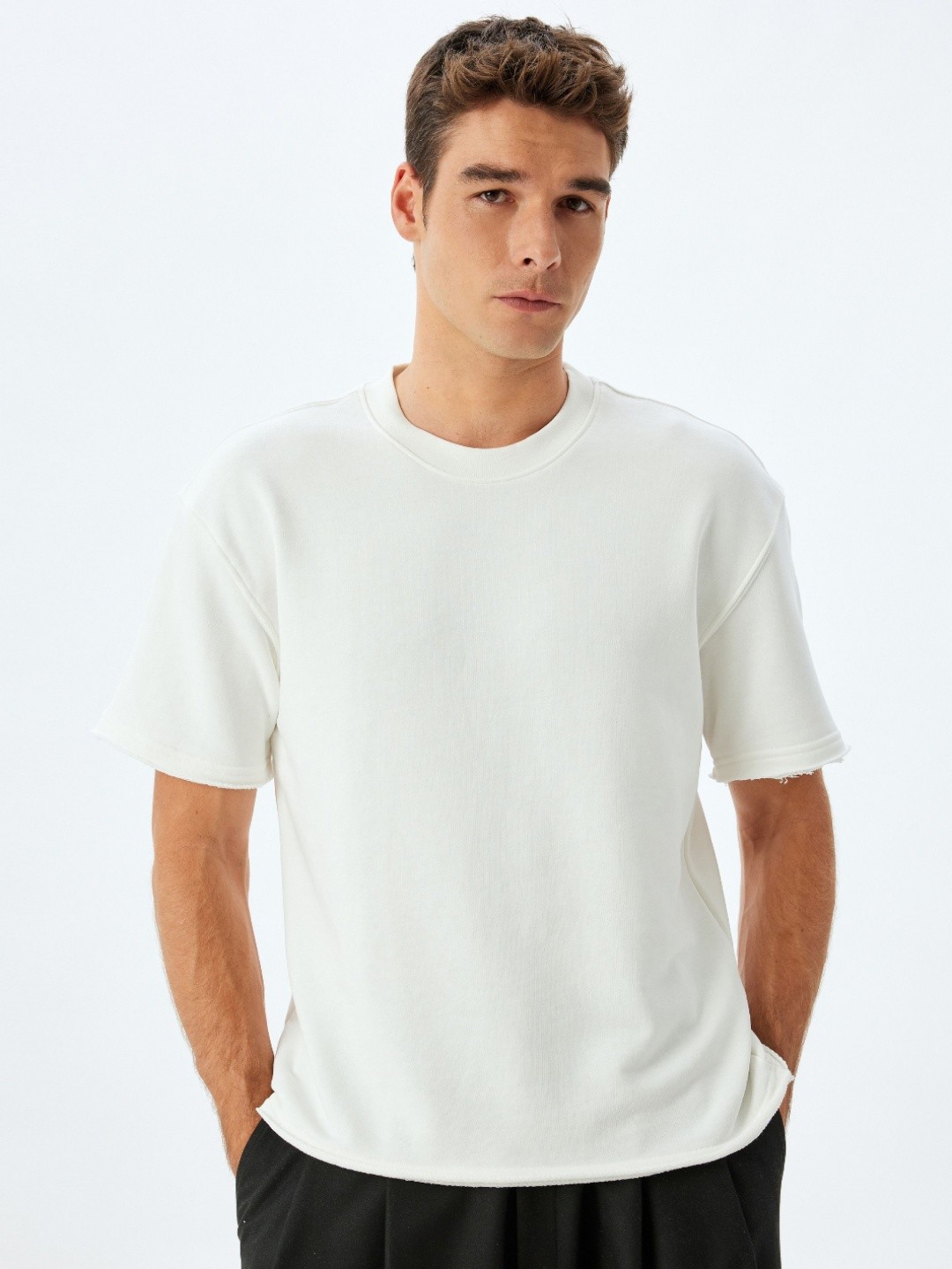 

Koton Men Solid Round Neck Cotton T-shirt, White