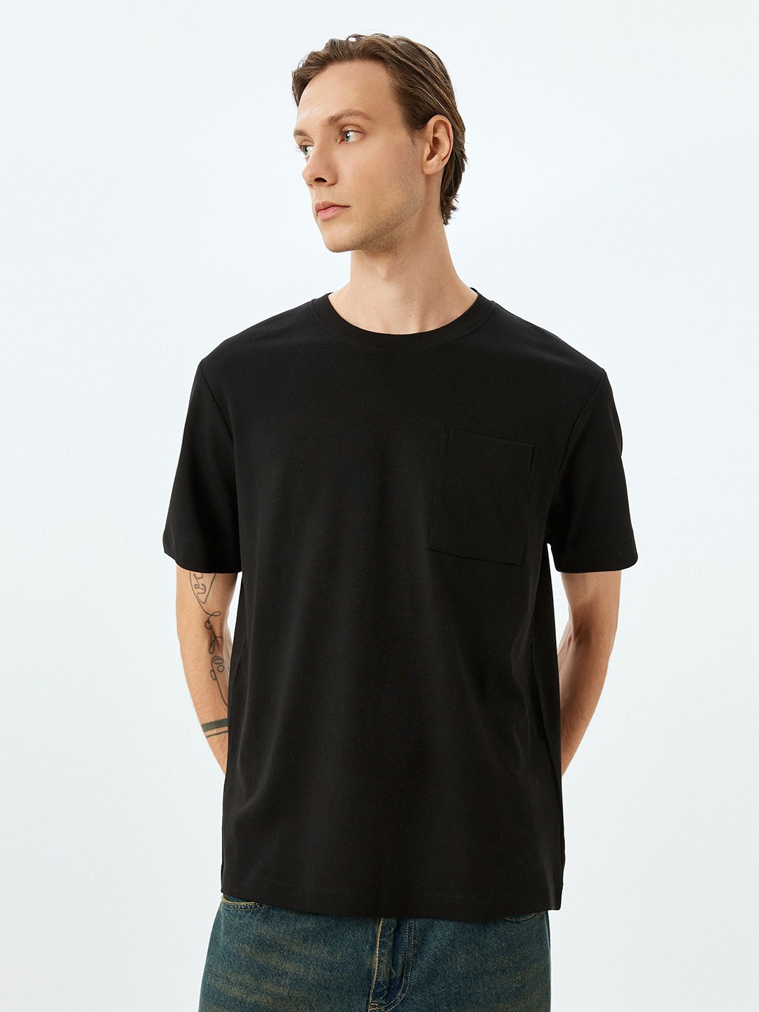 

Koton Men Solid Round Neck Cotton T-shirt, Black