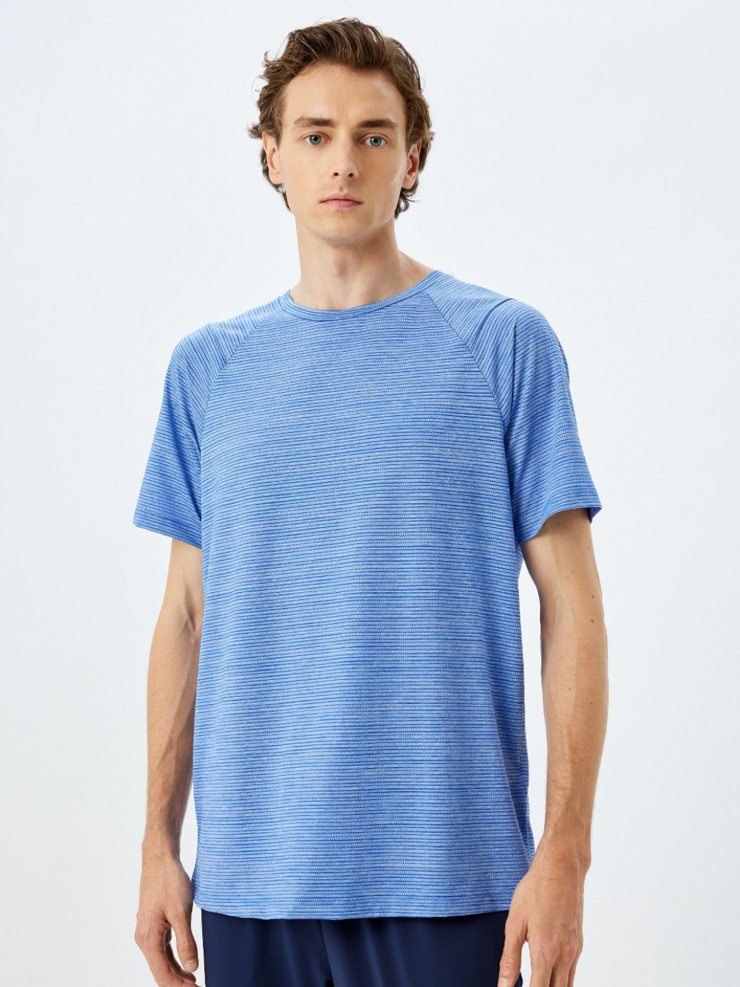 

Koton Men Solid Round Neck T-shirt, Blue