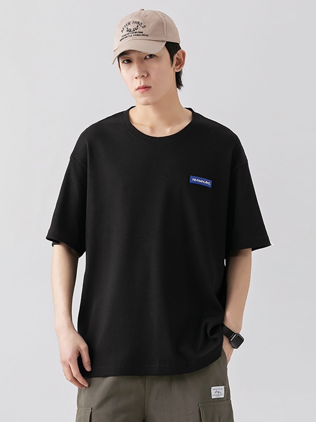 

StyleCast x Revolte Men Solid Round Neck Relaxed Fit T-shirt, Black