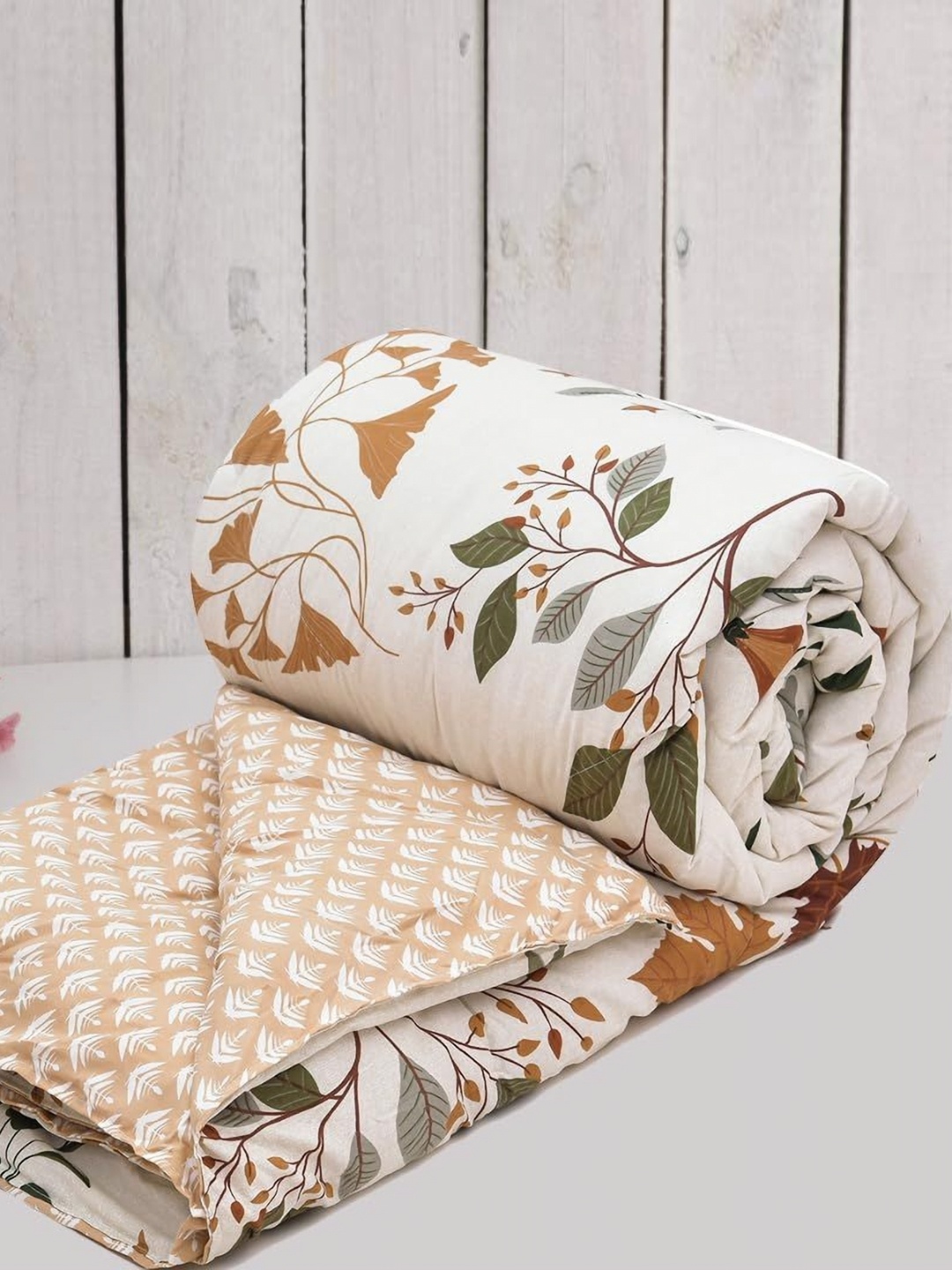 

Myntra Elegant Homes Cream-Coloured & White Floral Microfiber Heavy Winter 210 GSM Single Bed Comforter