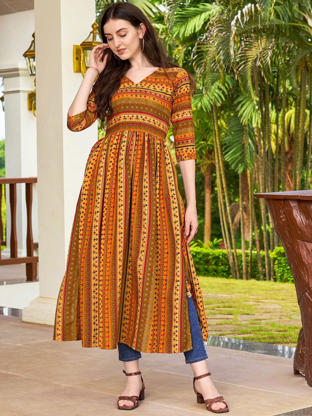 

TextileNow Geometric Printed V-Neck Latkans Detail Straight Nayra Kurta, Yellow