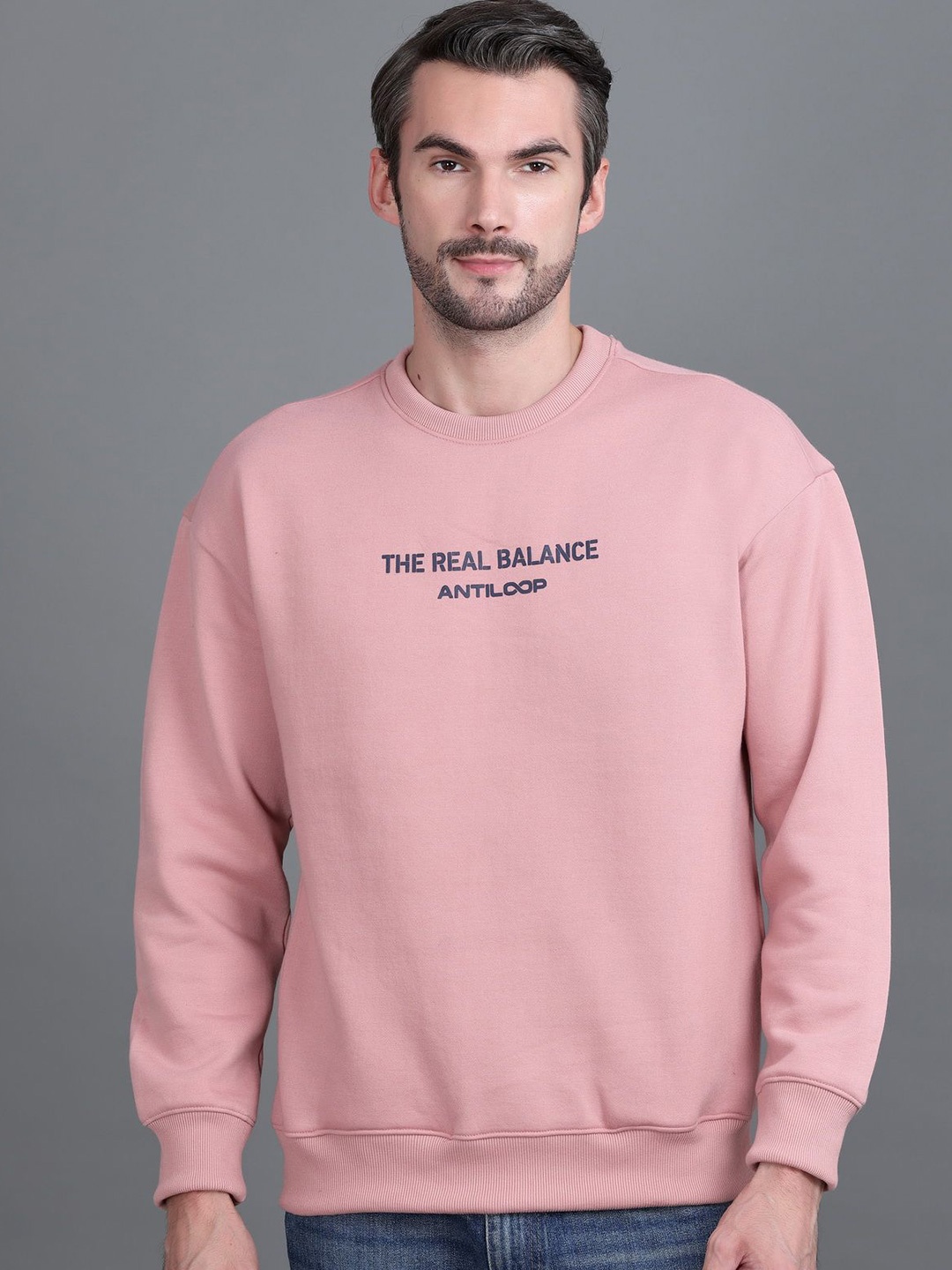 

Antiloop Men Printed Drop Shoulder Round Neck Sweatshirt, Pink