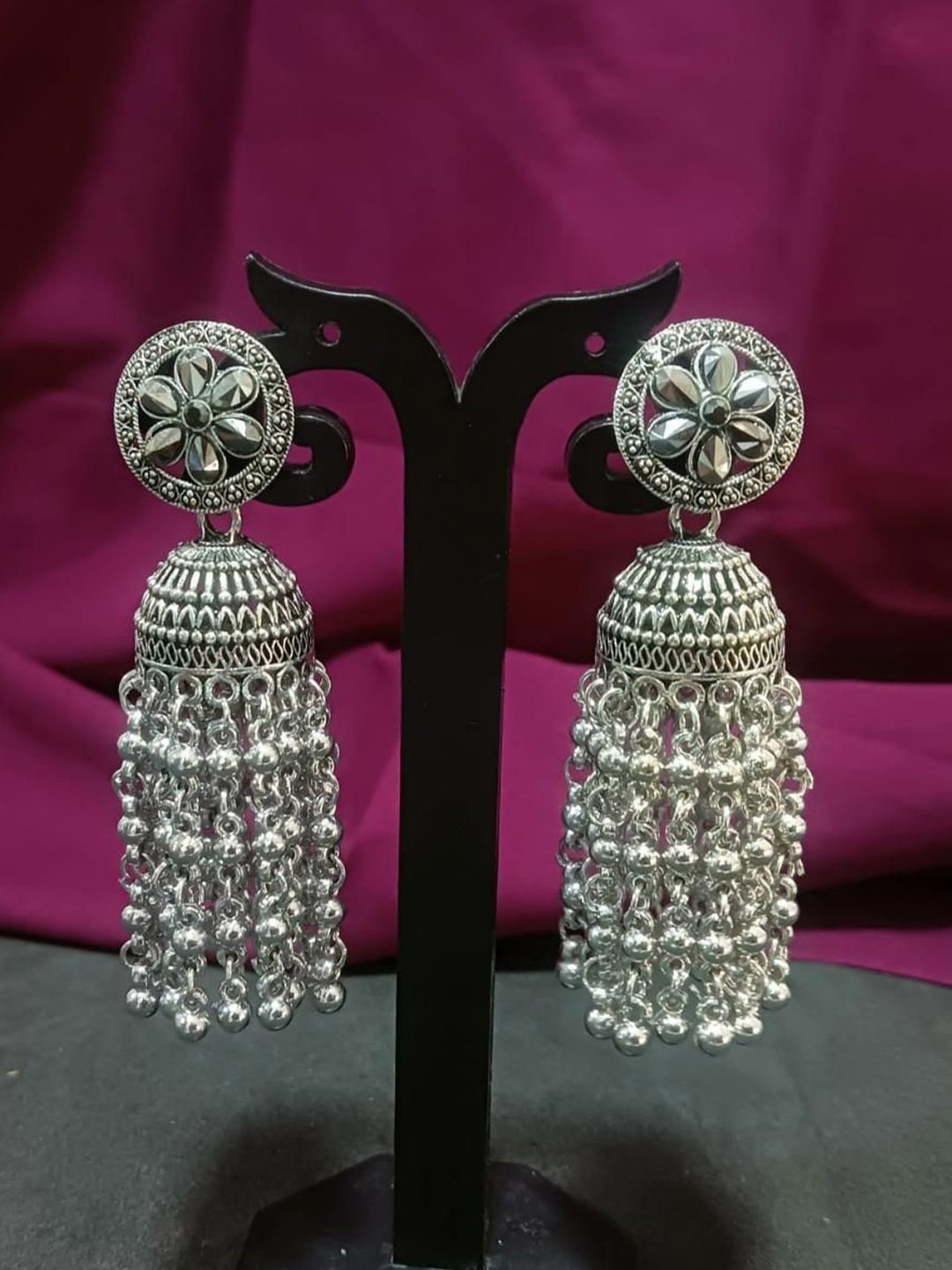 

Efulgenz Rhodium Plated Crystals Studded Contemporary Jhumkas Earrings, Silver