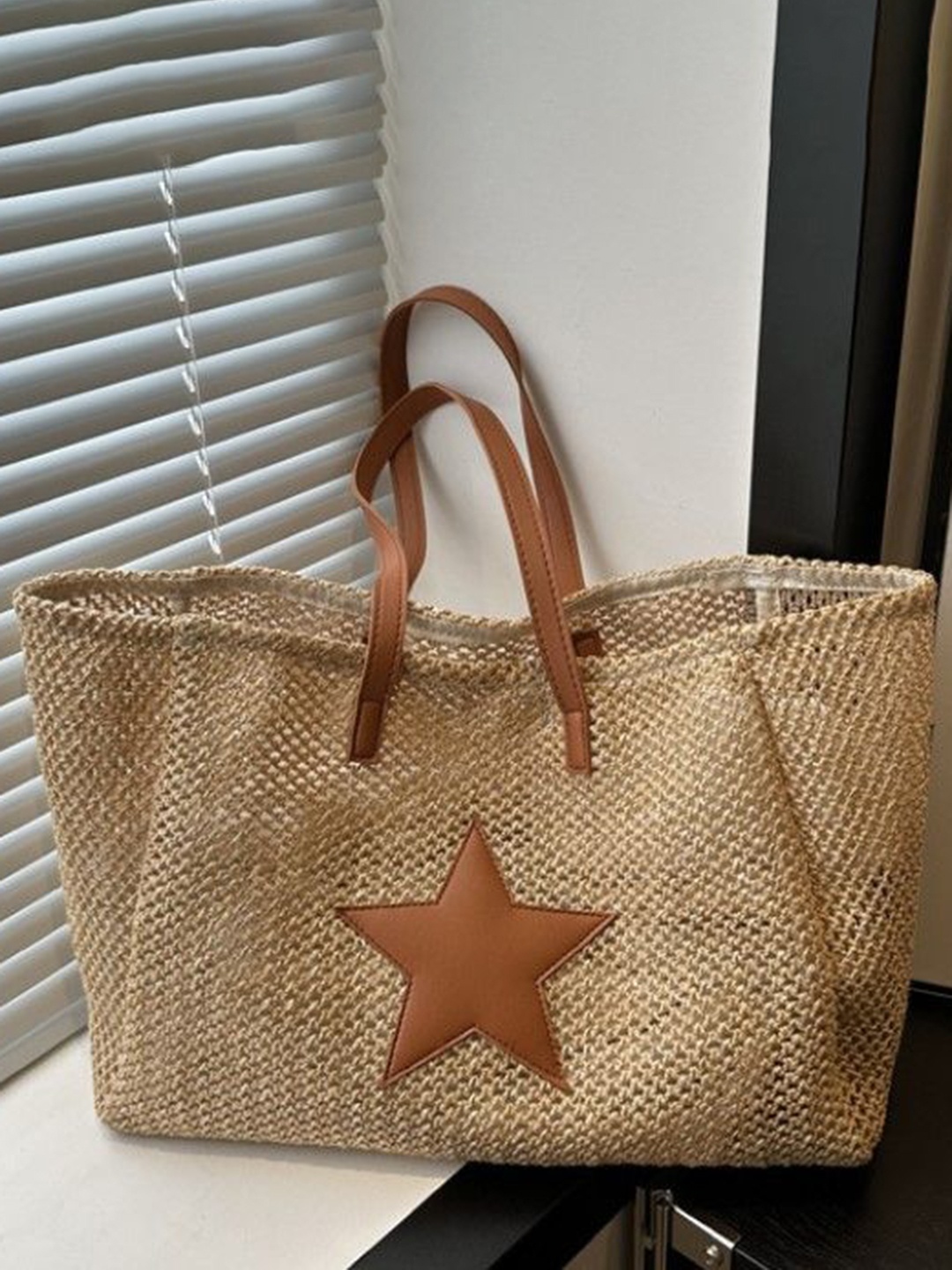 

StyleCast Textured Structured Handheld Bag with Tasselled, Beige