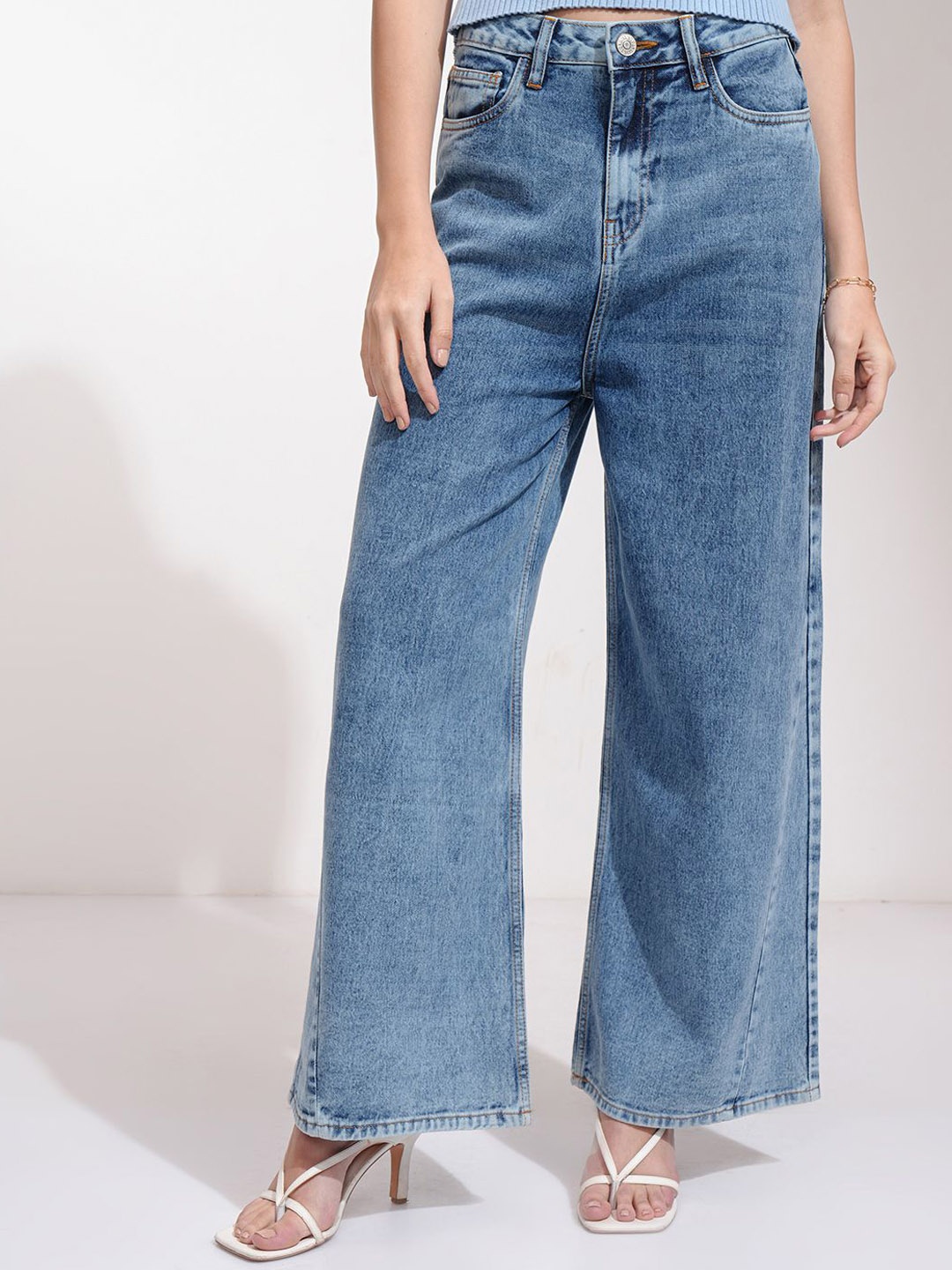 

Basics By Tokyo Talkies Women Flared High-Rise Light Fade Jeans, Blue