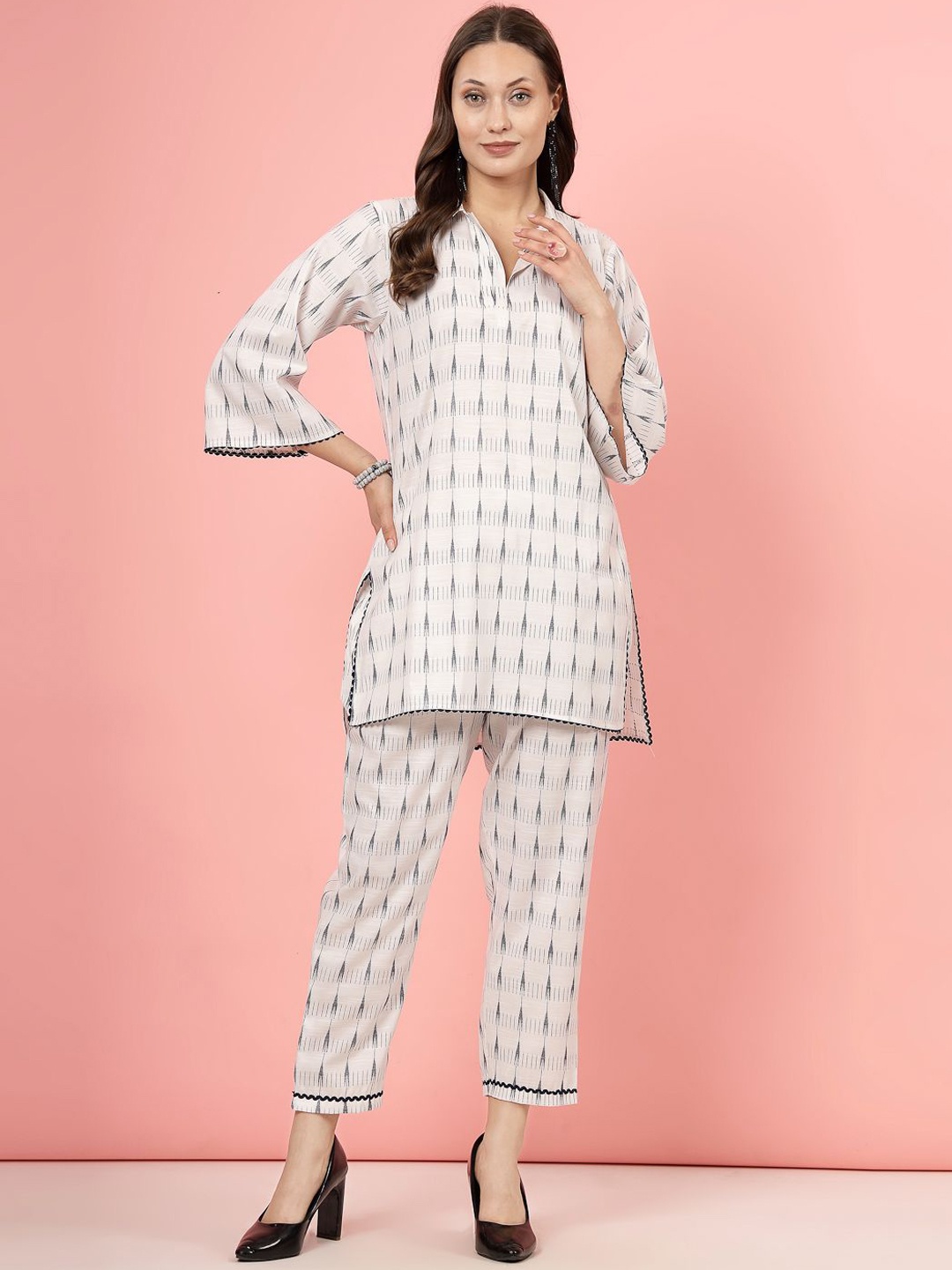 

Clora Creation Self Design Shirt Collar Tunic With Trouser, White