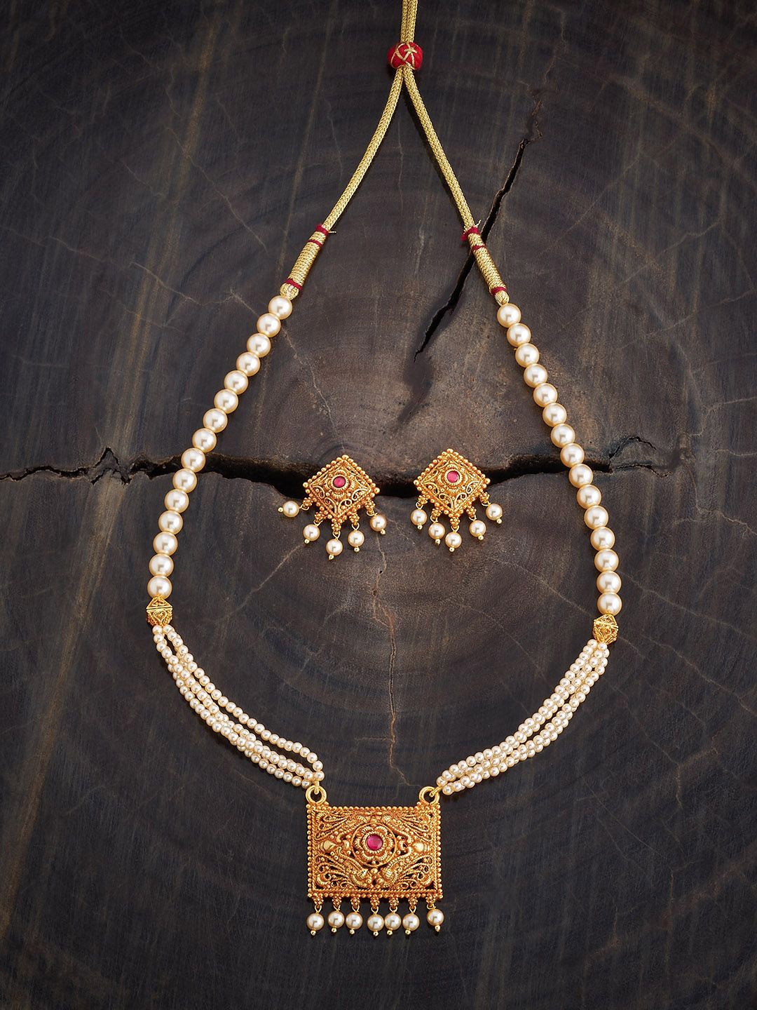 

Kushal's Fashion Jewellery Gold-Plated Stone Studded & Beaded Antique Jewellery Set