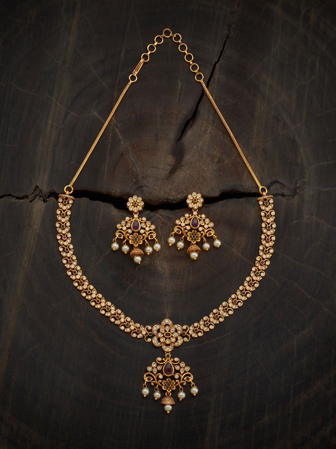 

Kushal's Fashion Jewellery Gold-Plated Stone Studded & Beaded Antique Necklace & Earrings