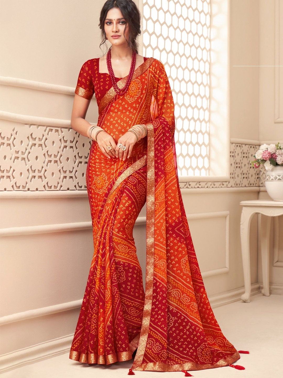 

Reboot Fashions Printed Zari Pure Chiffon Bandhani Saree, Orange