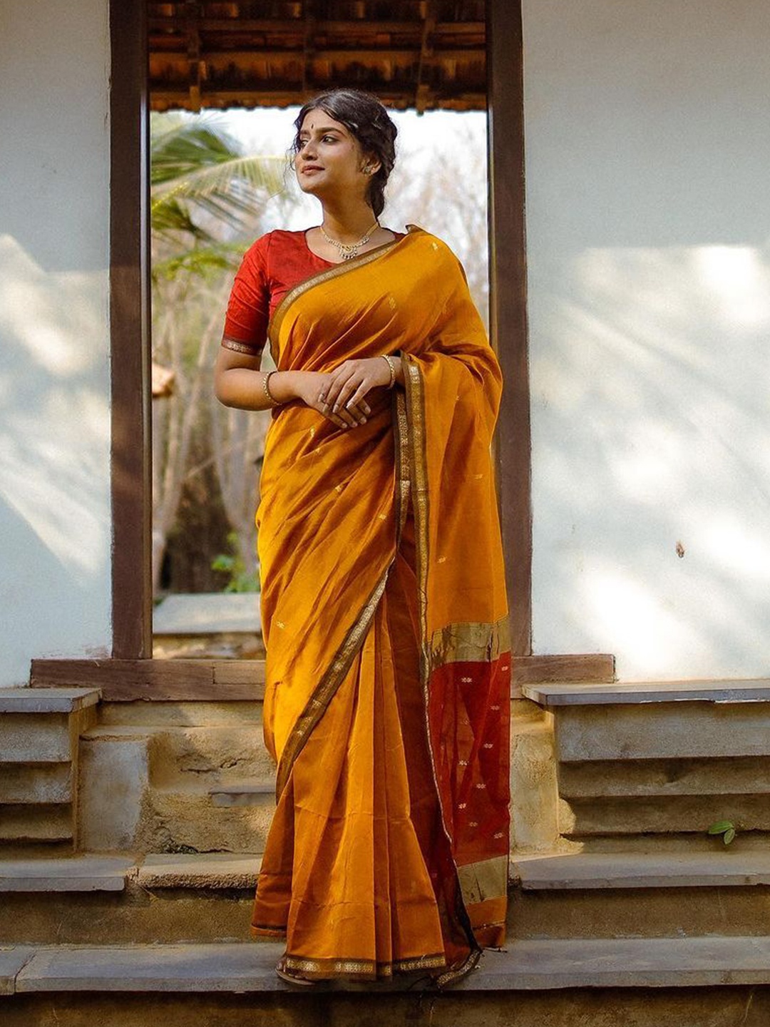 

Kriyansh Ethnic Motifs Woven Design Zari Kanjeevaram Saree, Mustard