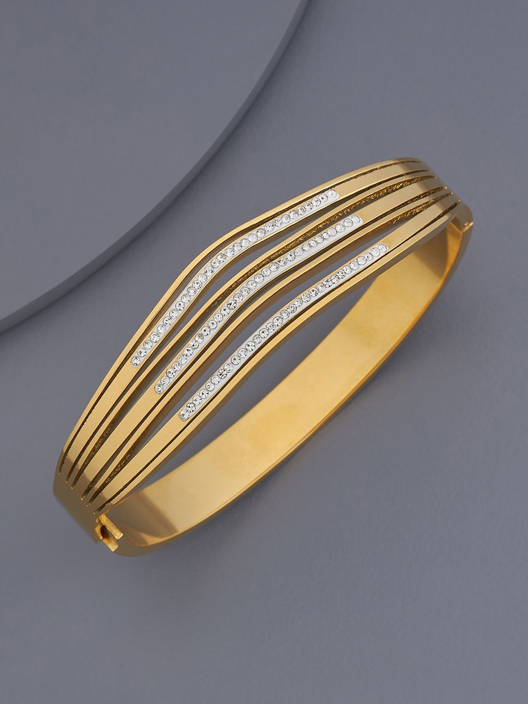 

Kushal's Fashion Jewellery Gold Plated Stones Studded Kada Bracelet
