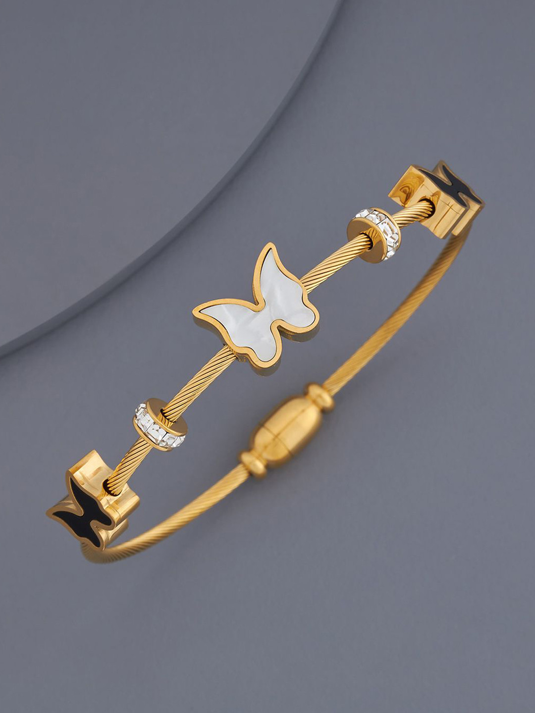 

Kushal's Fashion Jewellery Gold Plated Stones Studded Kada Bracelet