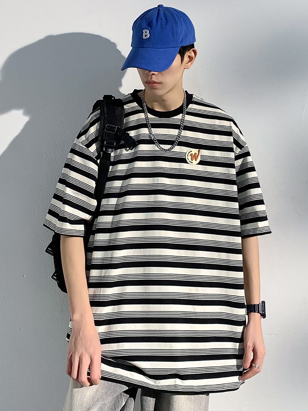 

StyleCast x Revolte Men Striped Round Neck Oversized T-shirt, Black