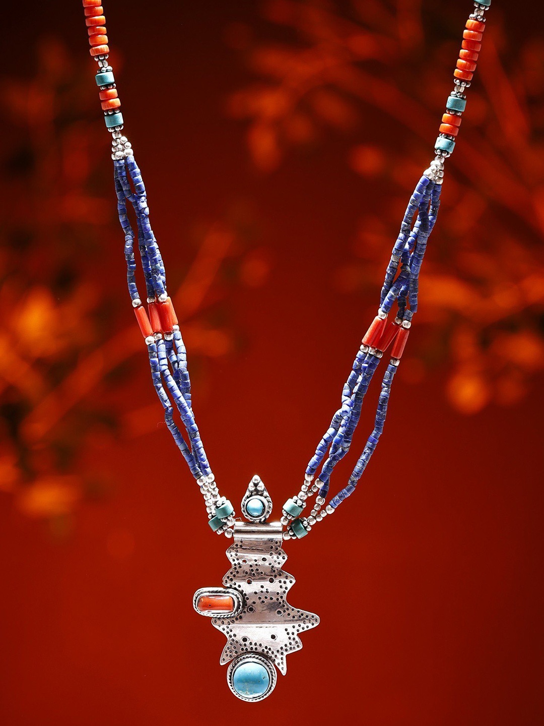 

Exotic India Sterling Silver Necklace with Auspicious Turquoise Coral Lapis Lazuli Beads