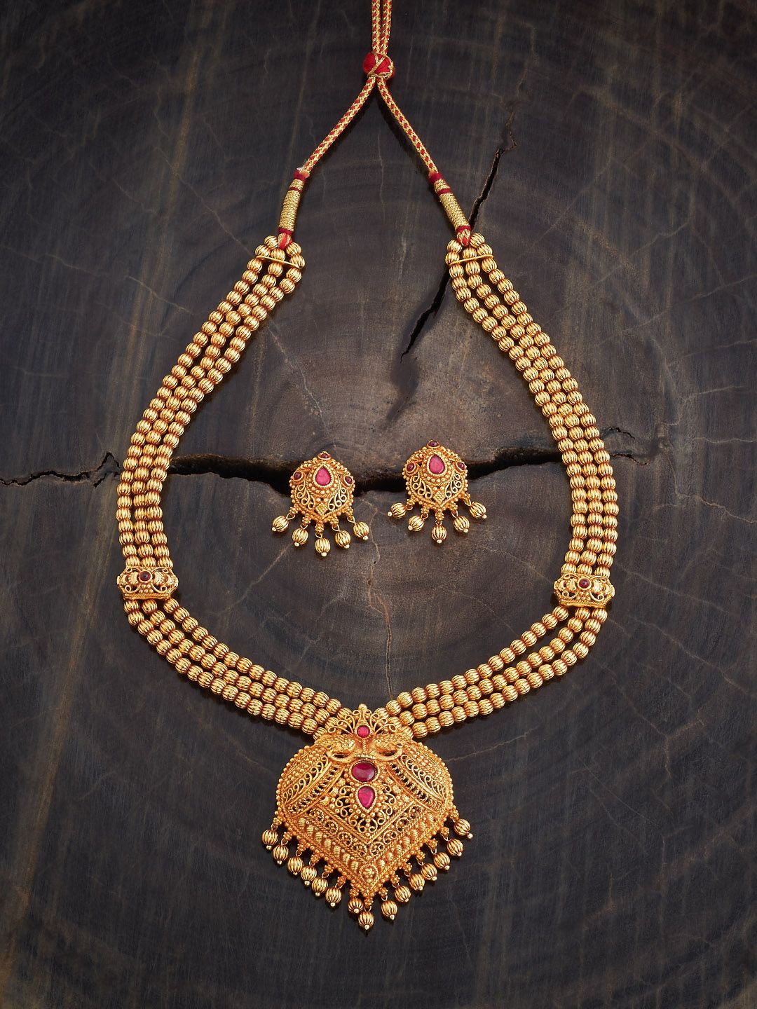 

Kushal's Fashion Jewellery Gold-Plated Stone-Studded Antique Jewellery Set