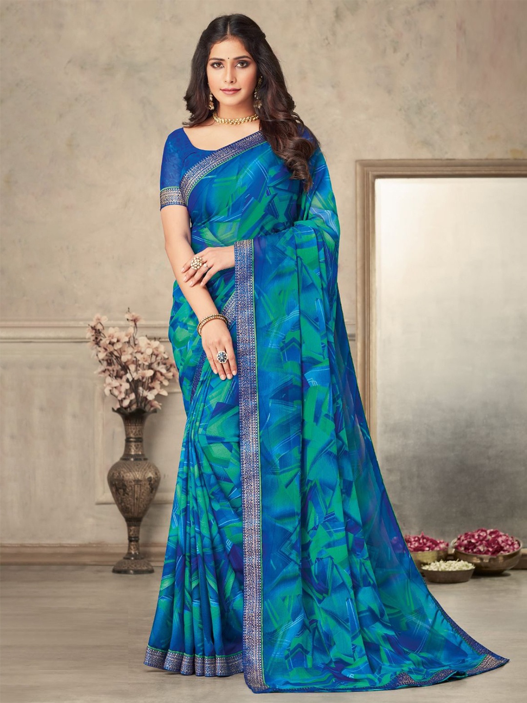 

Reboot Fashions Printed Pure Chiffon Saree, Blue
