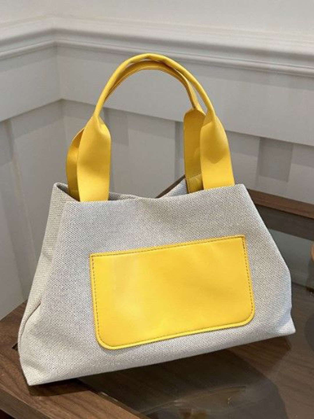 

StyleCast Textured Structured Handheld Bag with Cut Work, White