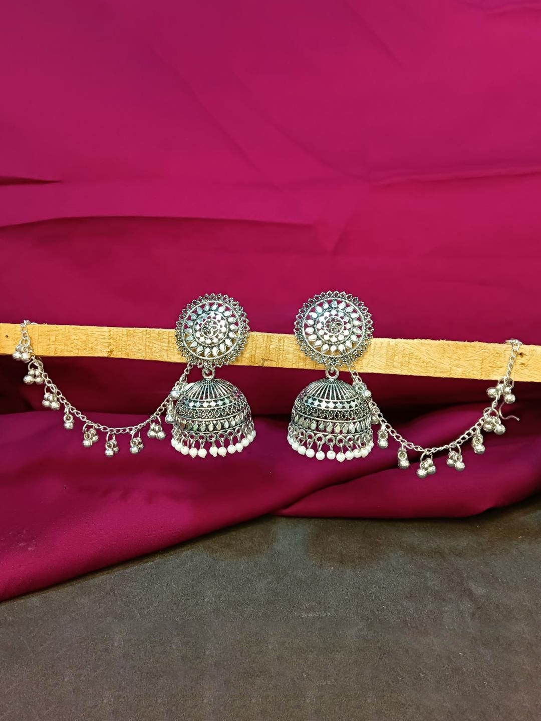 

Efulgenz Rhodium-Plated Dome Shaped Oxidised Jhumkas With Charms Hair Chain Accessories, Silver