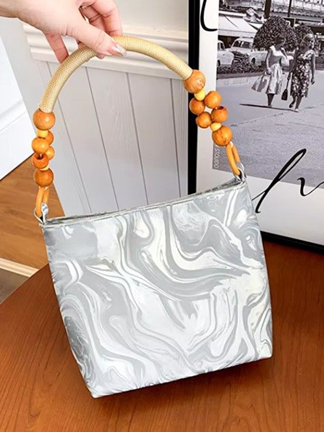 

StyleCast Textured Bucket Handheld Bag with Tasselled, Grey