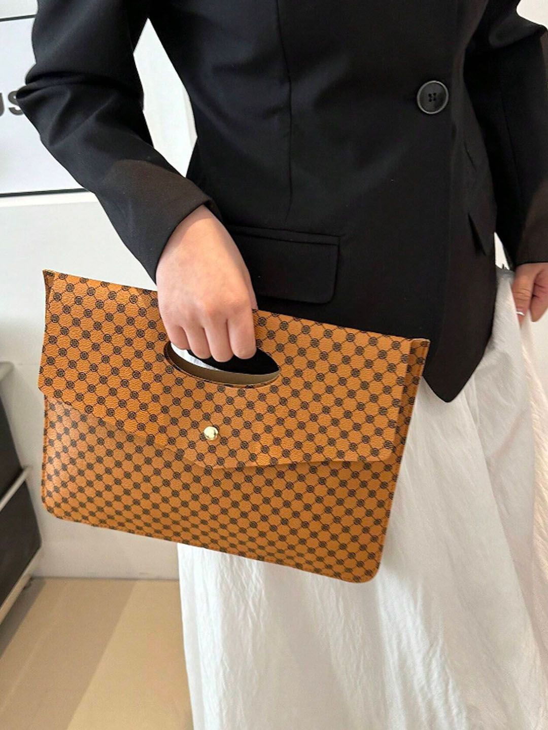 

StyleCast Brown Geometric Printed Structured Handheld Bag
