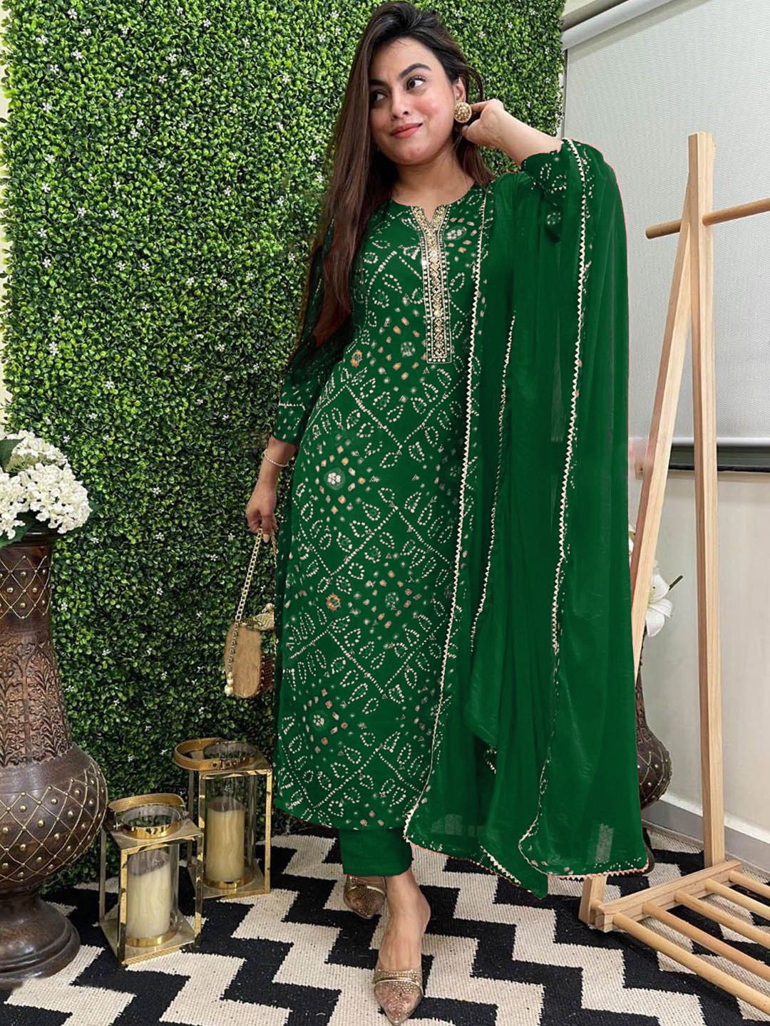 

GoSriKi Women Bandhani Printed Regular Kurta with Trousers & With Dupatta, Green