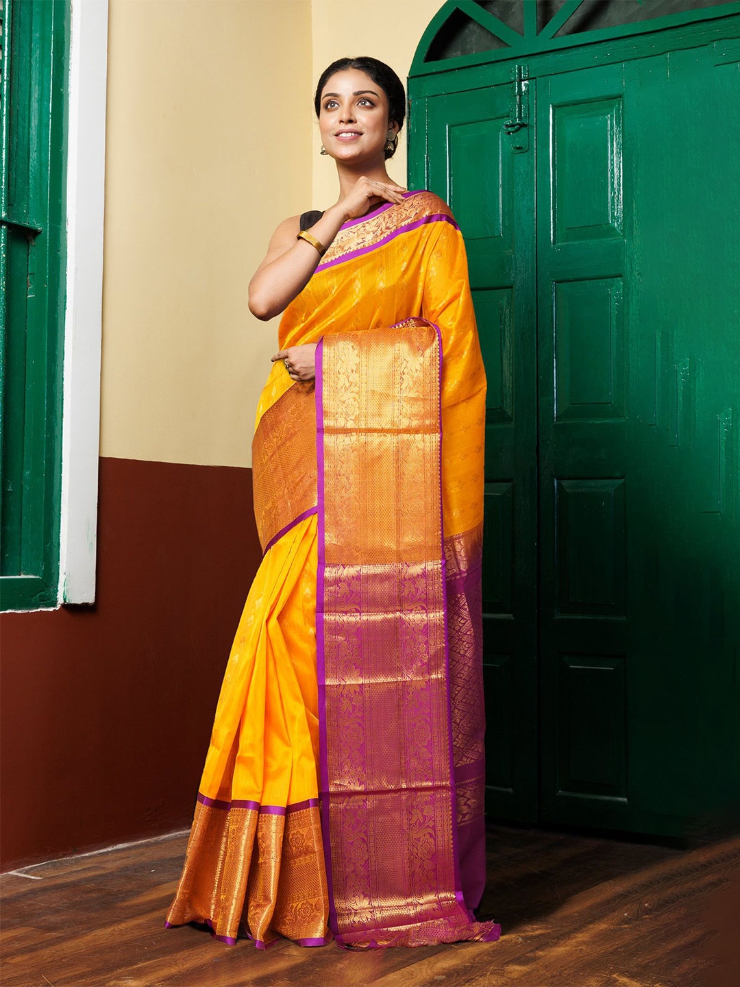 

Unnati Silks Woven Design Zari Silk Cotton Handloom Kanjeevaram Saree, Yellow