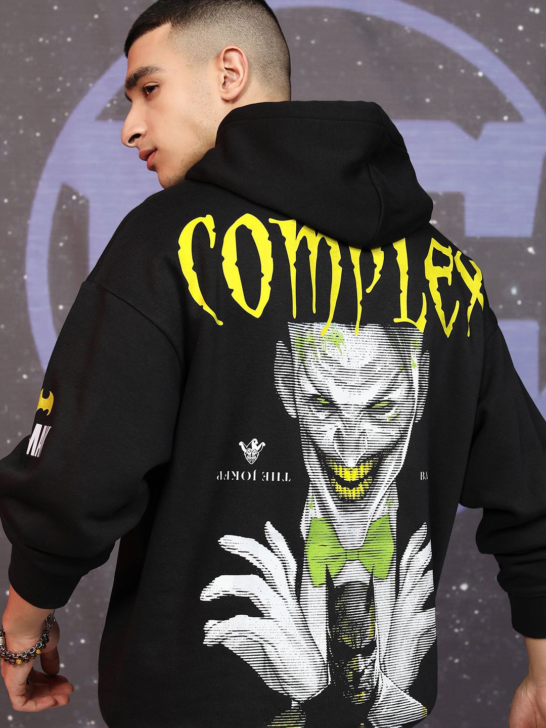 

HIGHLANDER Men Warner Bros Men Joker Printed Hooded Oversized Pullover Sweatshirt, Black