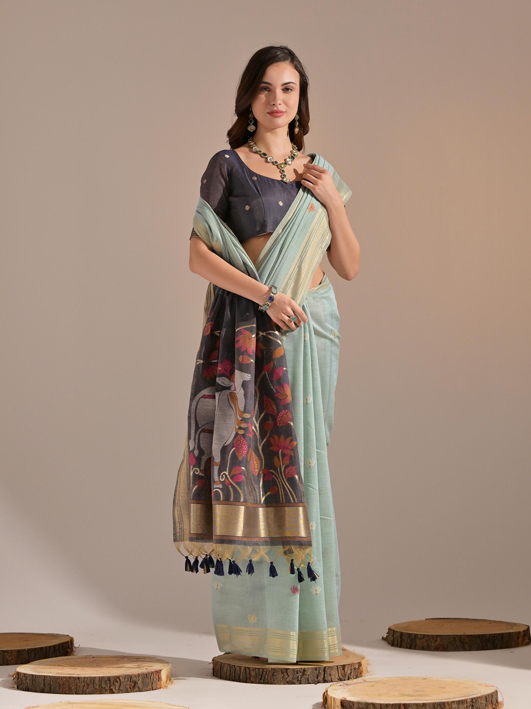 

Jinal & Jinal Woven Design Zari Muga Saree, Sea green