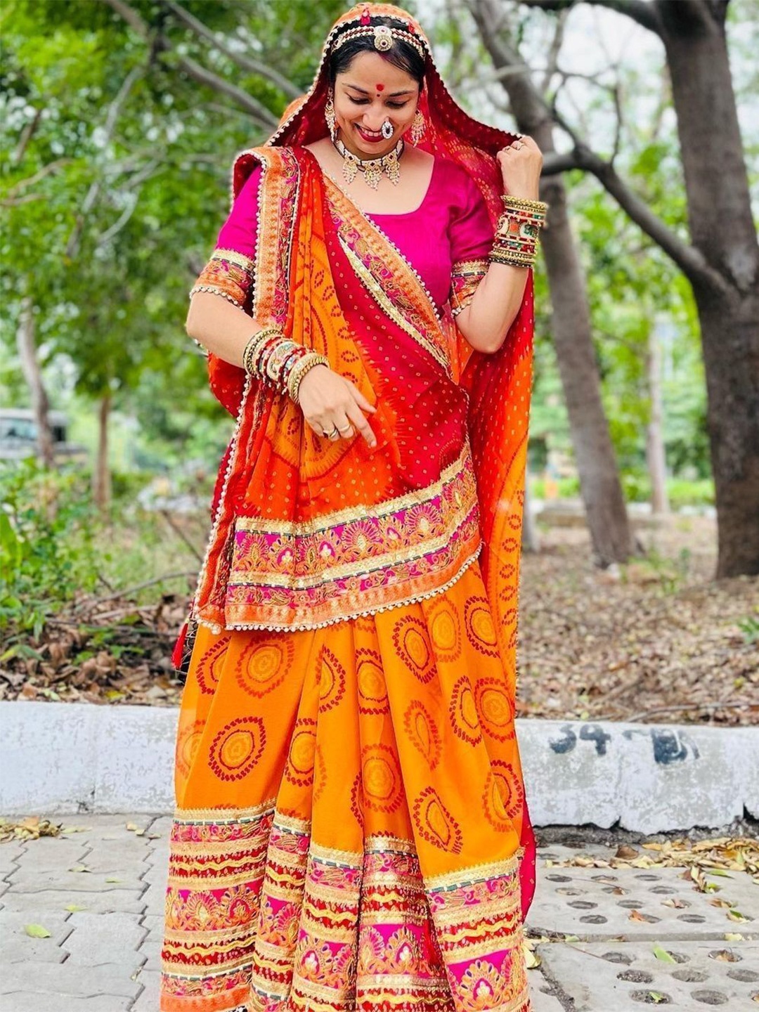 

KALINI Embroidered Pure Chiffon Bandhani Saree, Orange