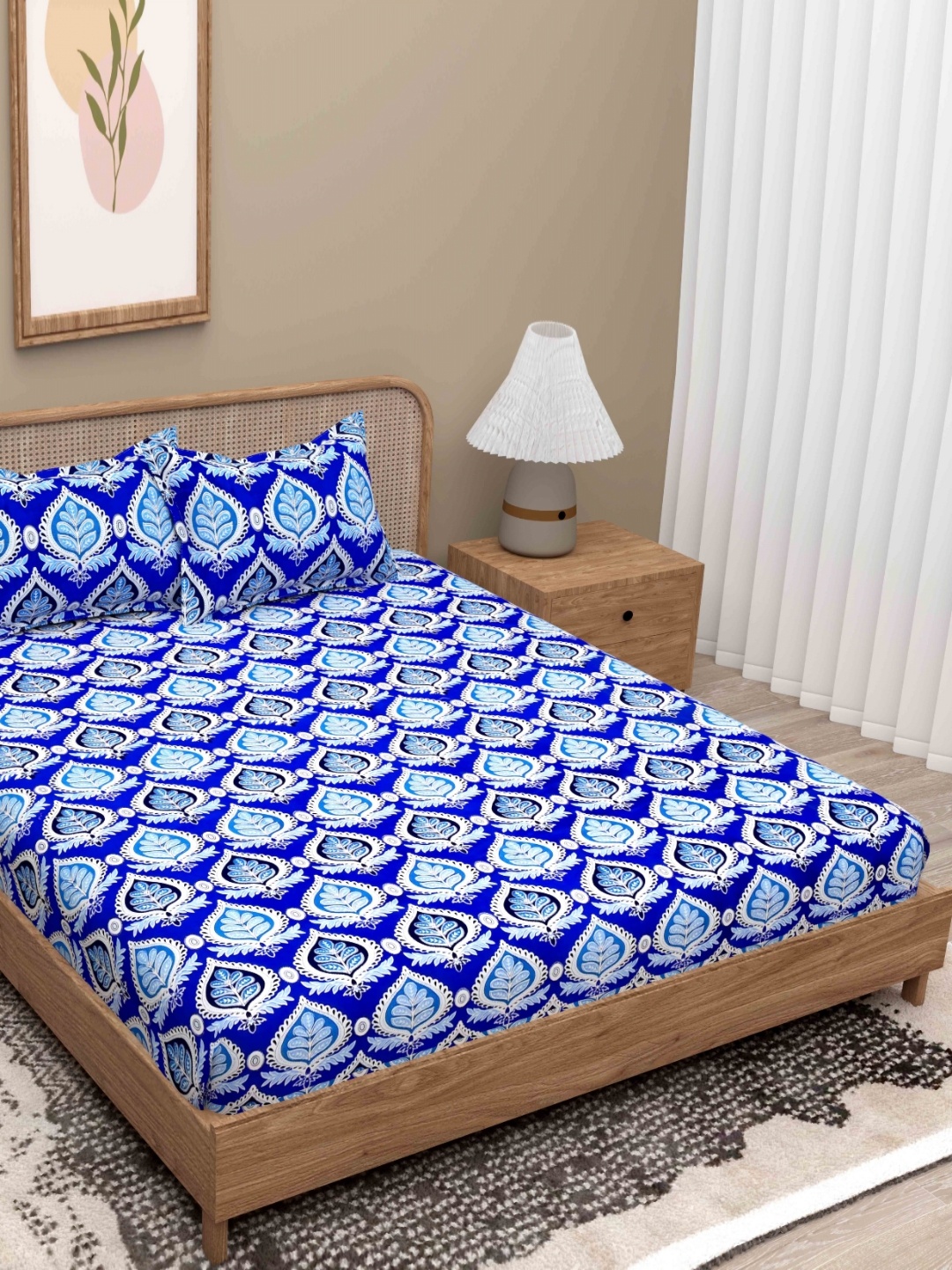 

Lali Prints Blue & White Geometric 180 TC Queen Bedsheet with 2 Pillow Covers