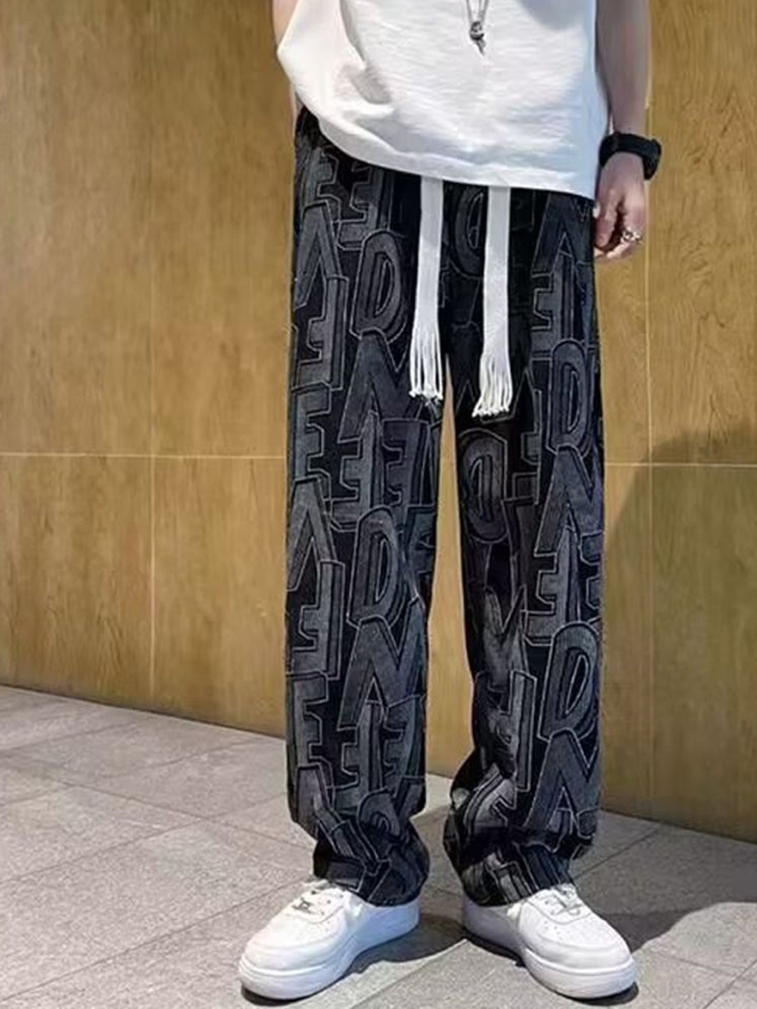 

StyleCast Men Printed Loose Fit Trousers, Black