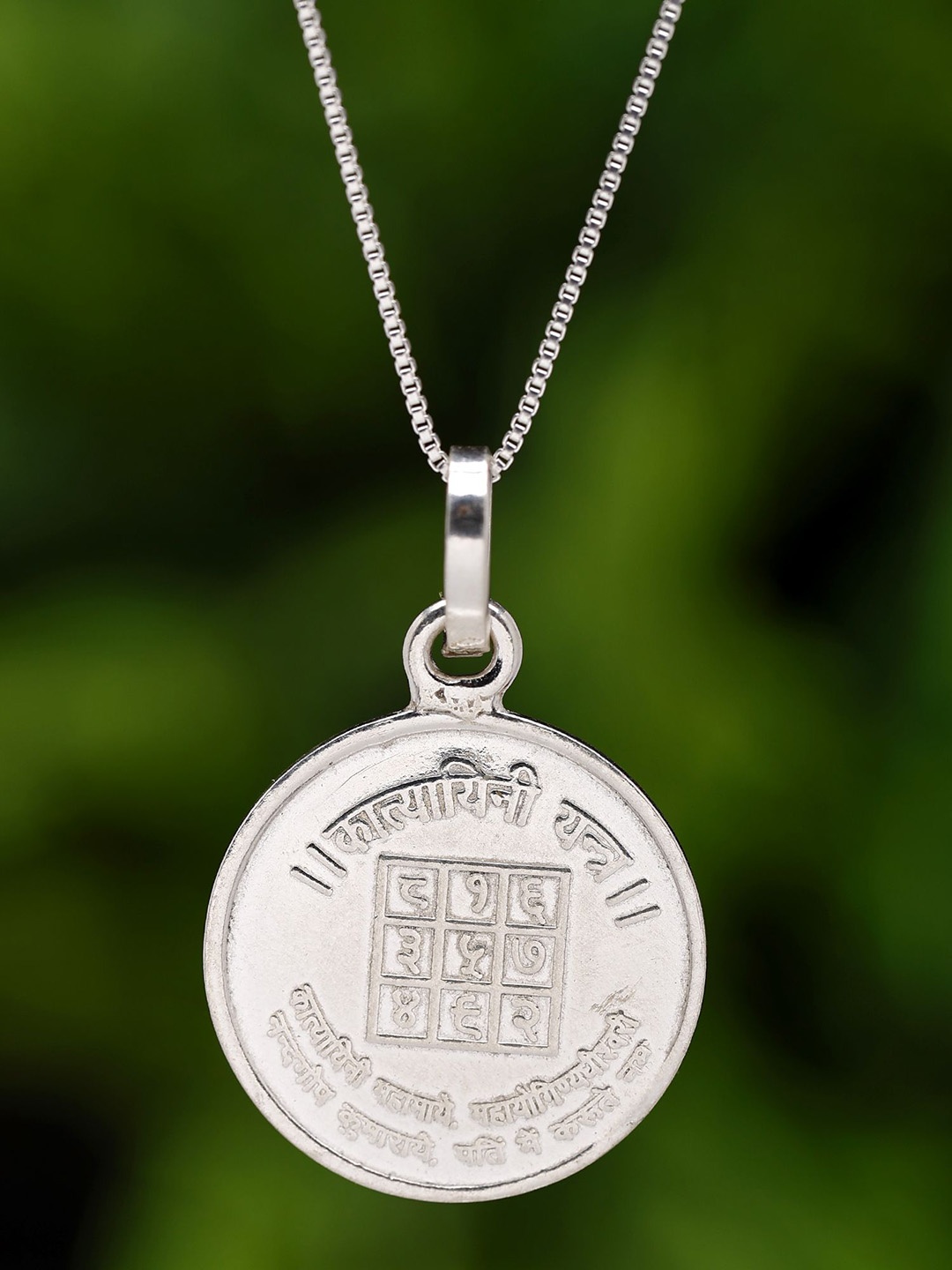 

Exotic India Maa Katyayani Pendant with Katyayani Yantra on Reverse (Two Sided Pendant), Silver