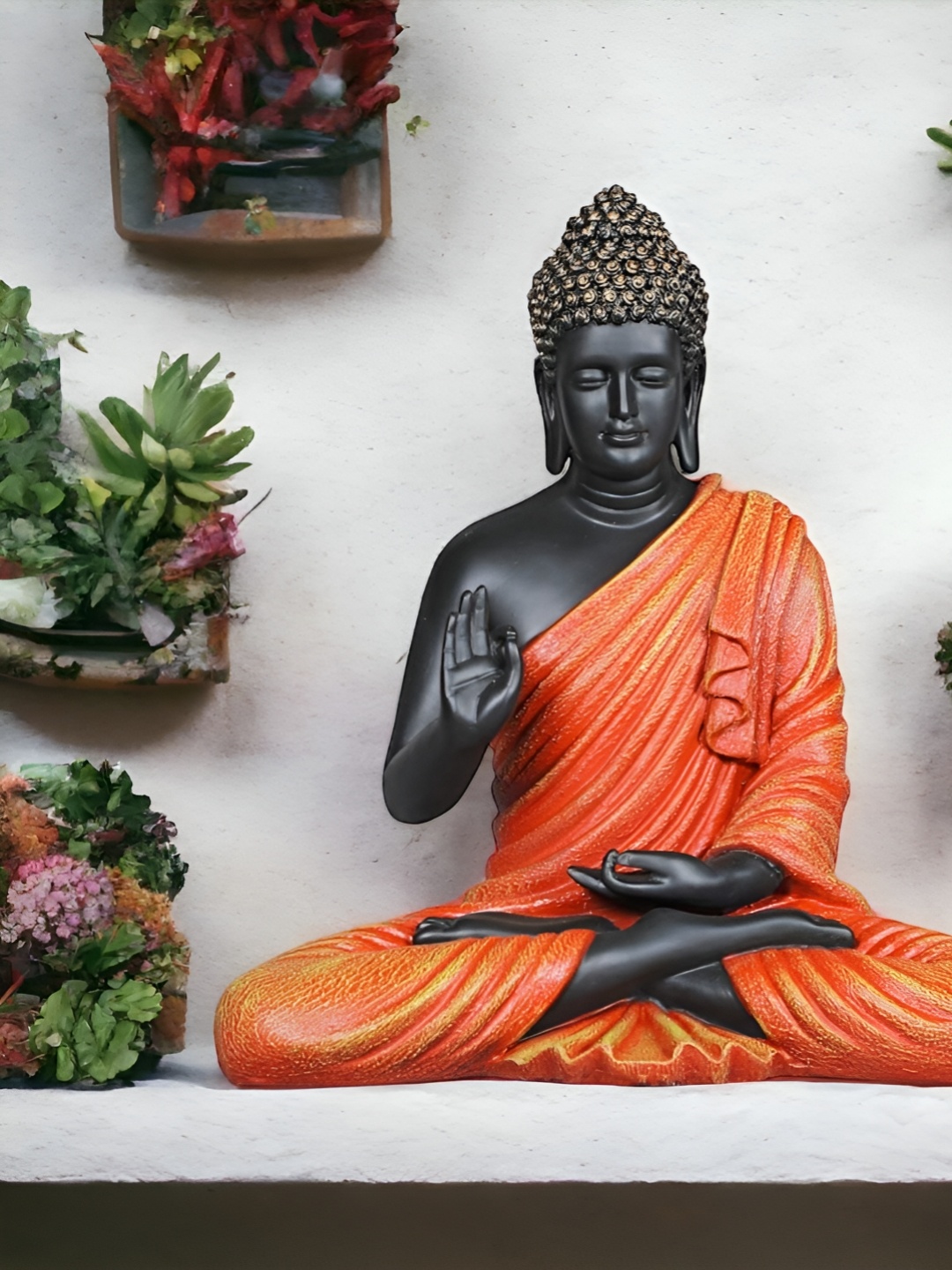 

NAYRA HANDICRAFTS Orange & Black Buddha Idol Showpiece