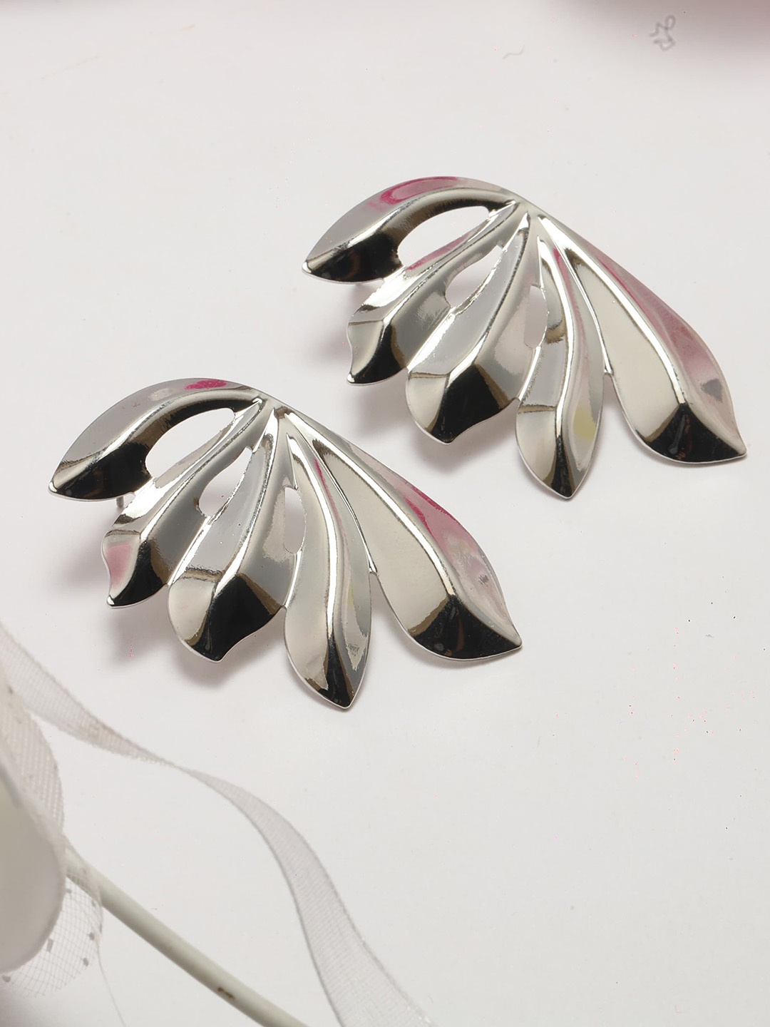 

Maansh Contemporary Silver-Plated Studs Earrings