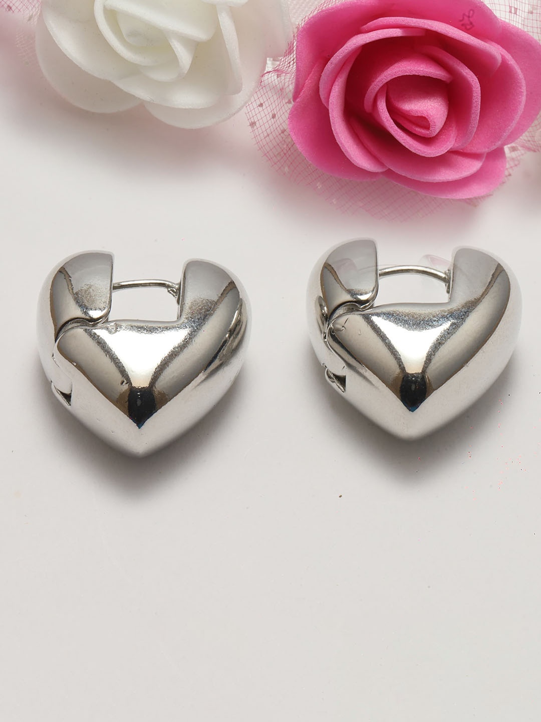 

Maansh Silver-Plated Contemporary Studs Earrings