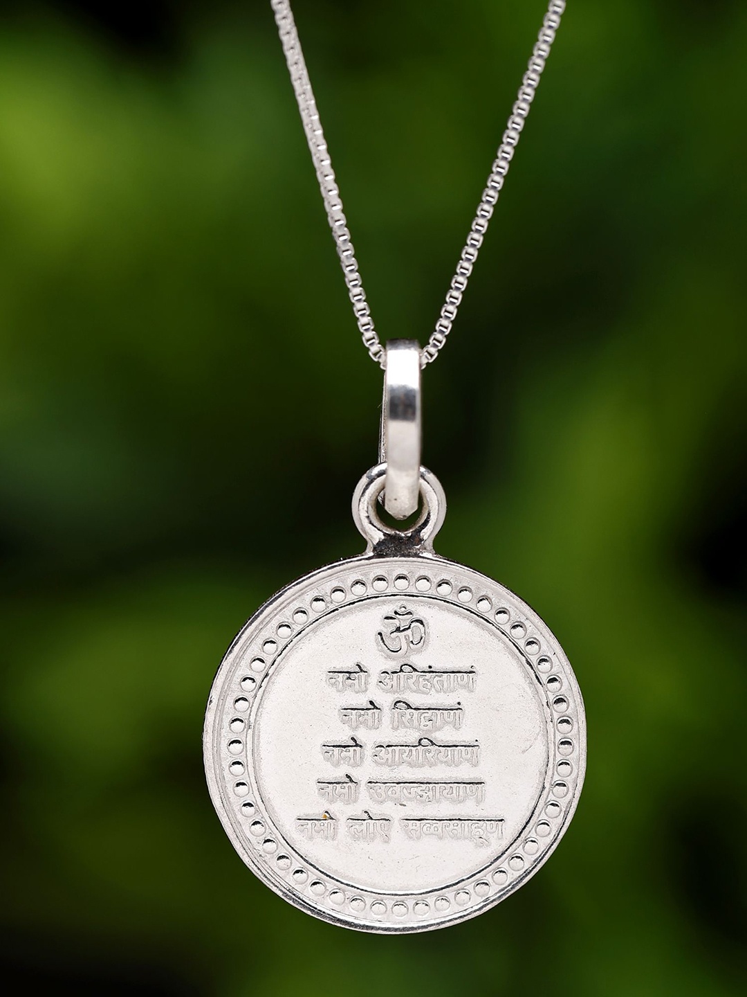 

Exotic India Trishul Swastik OM Pendant with Yantra on Reverse (Two Sided Pendant), Silver