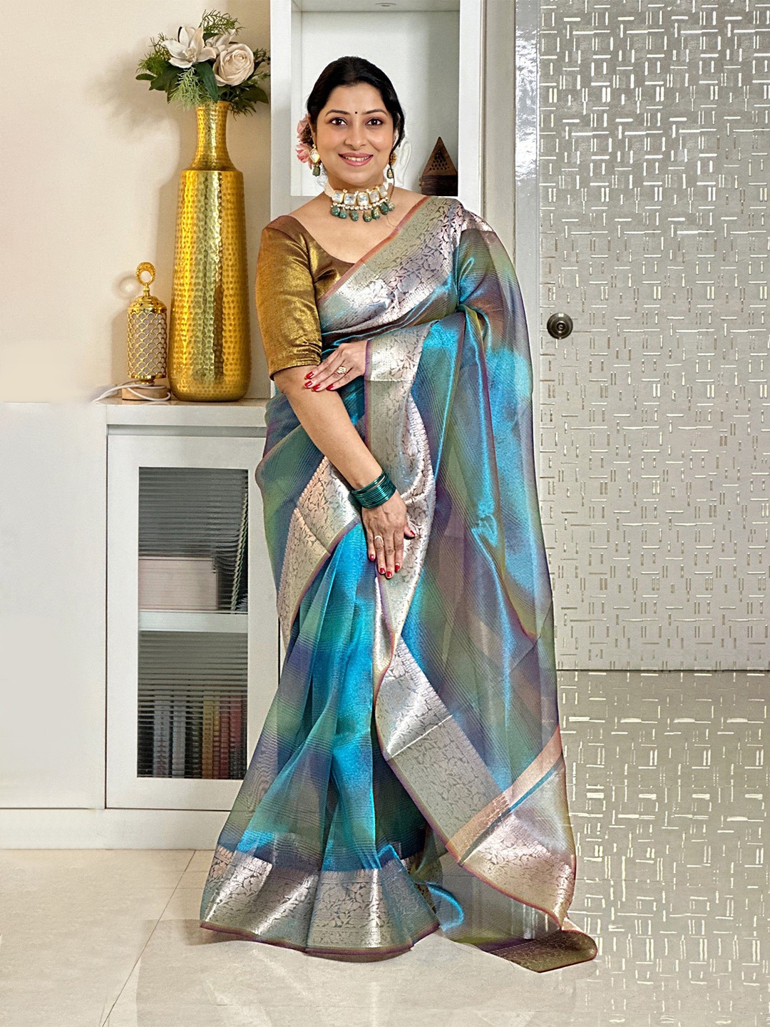 

Jinal & Jinal Striped Zari Tissue Saree, Blue