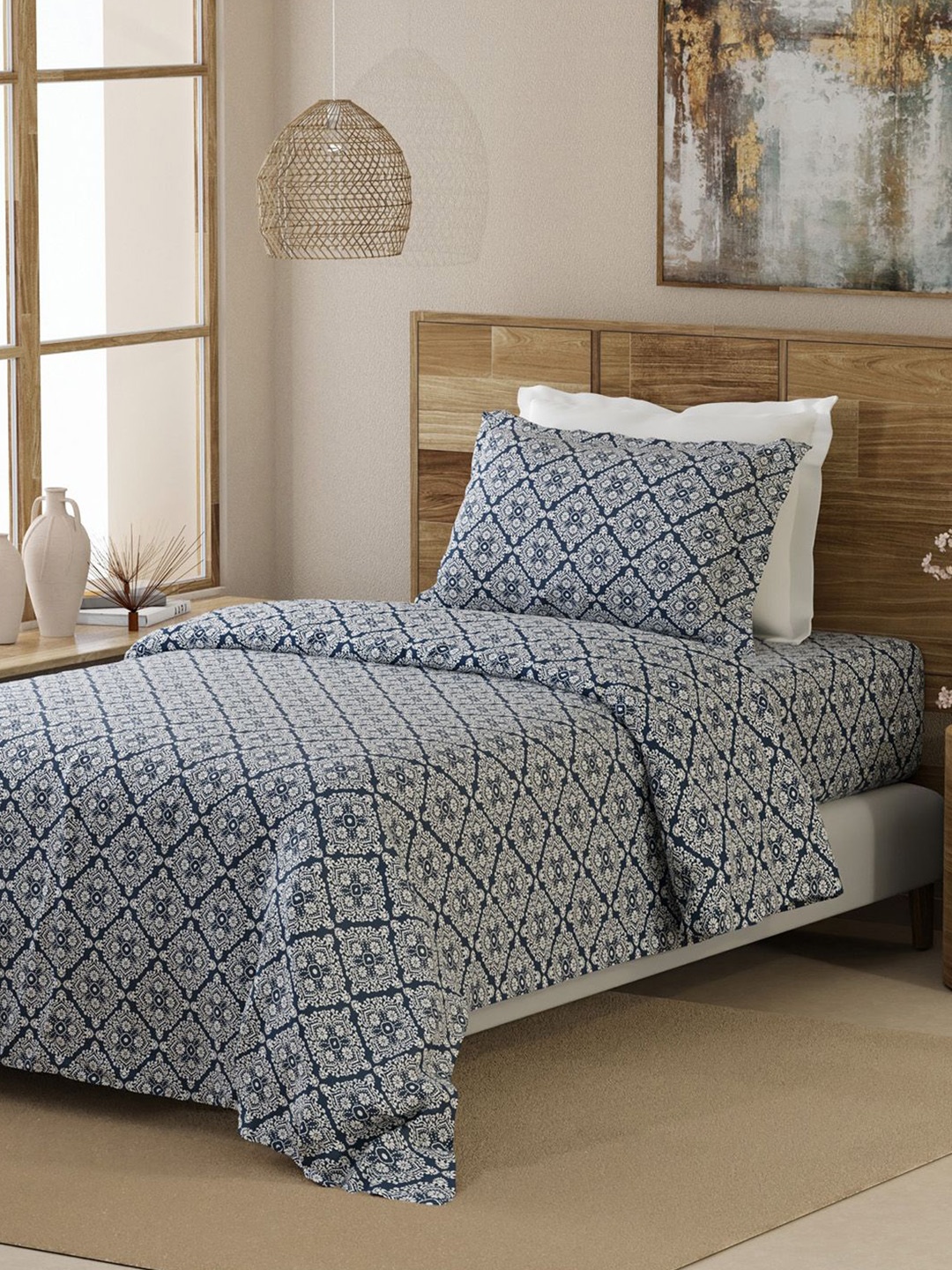 

Layers Blue & White Ethnic Motifs 144 TC Single Bedsheet with 1 Pillow Covers