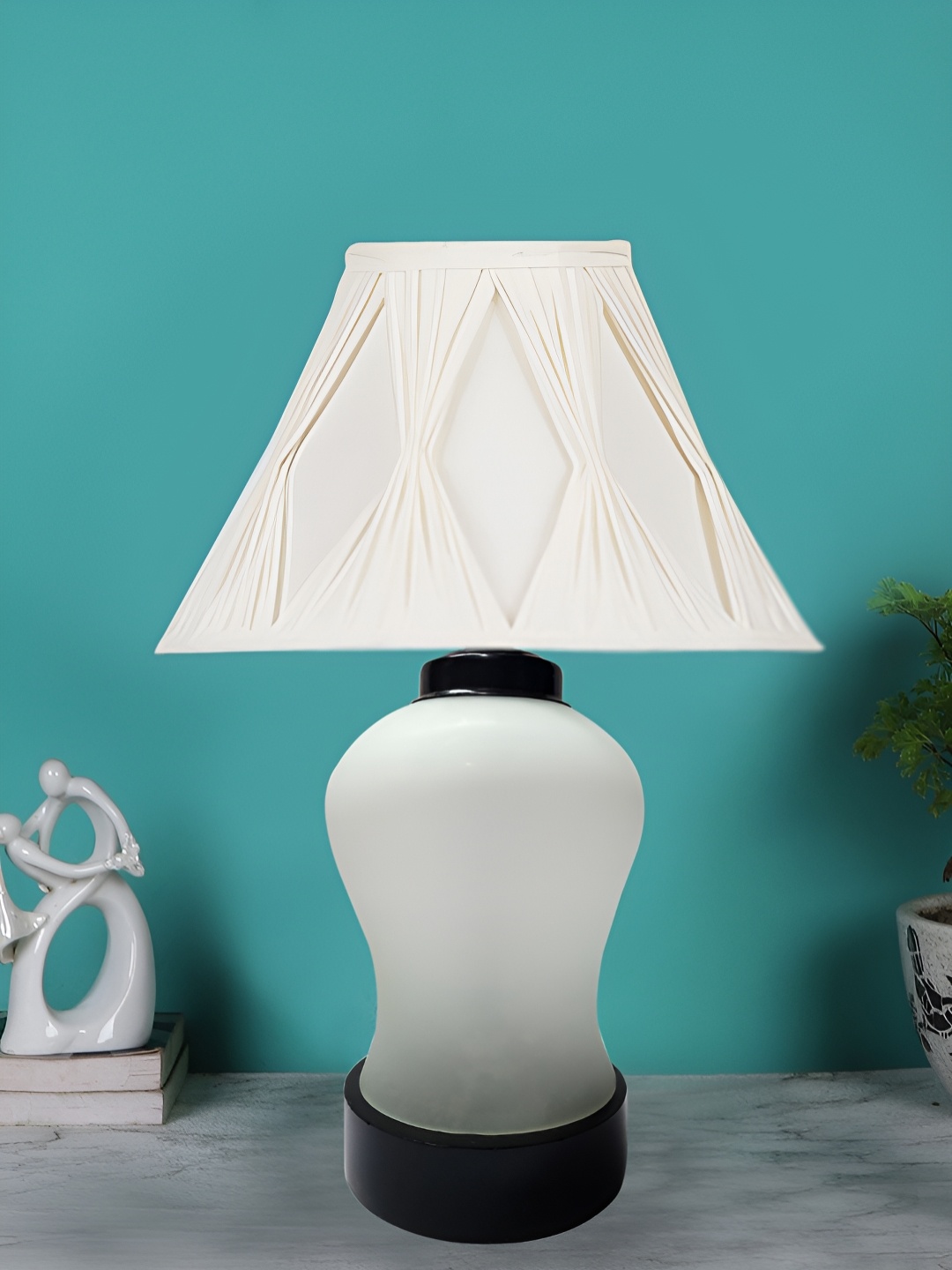 

Devansh Off White Glass Traditional Frusturical Shaped Table Lamp